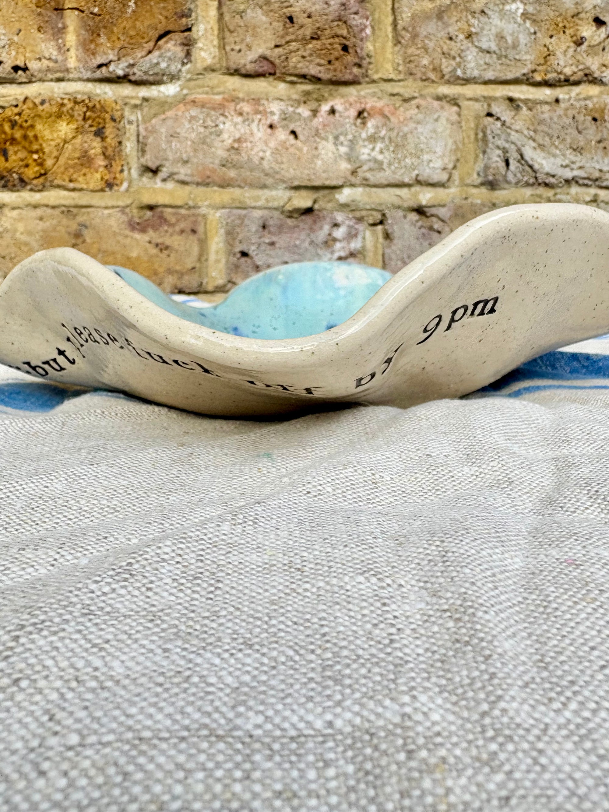 "good food, fine wine, great company..." serving dish