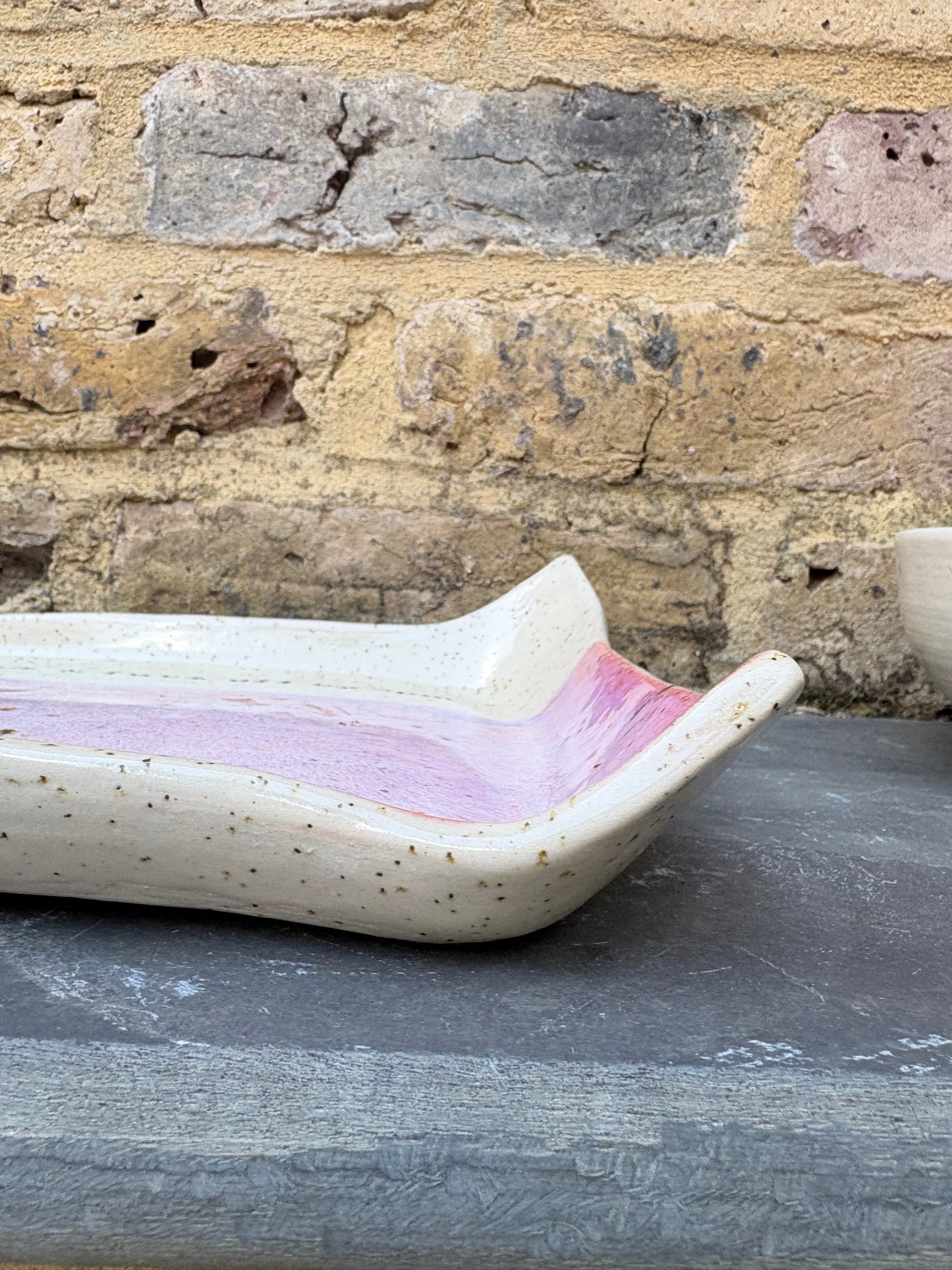 “eat, drink and fuck off by 9pm" rectangular dish (pink, flecked clay)