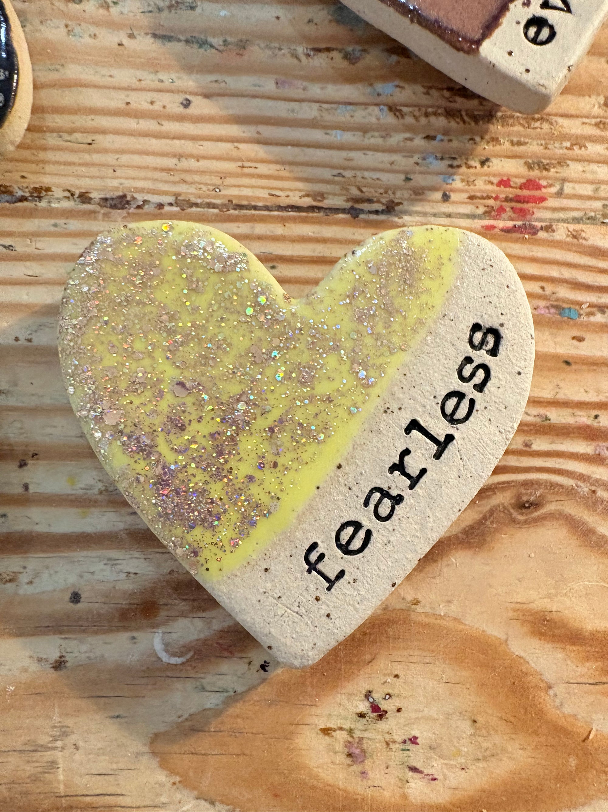 Twelve heart shaped Taylor Swift album magnets