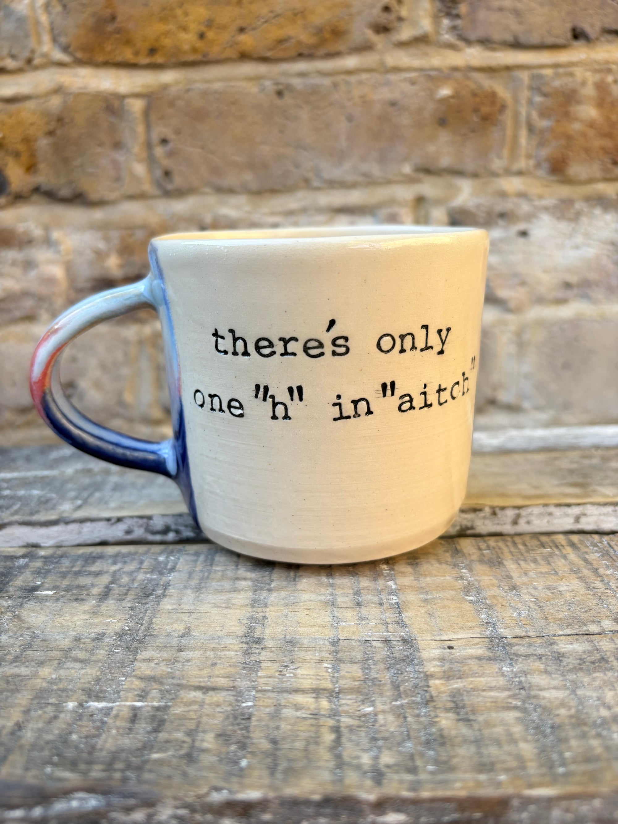 "there's only one "h" in "aitch" mug (blue night sky)