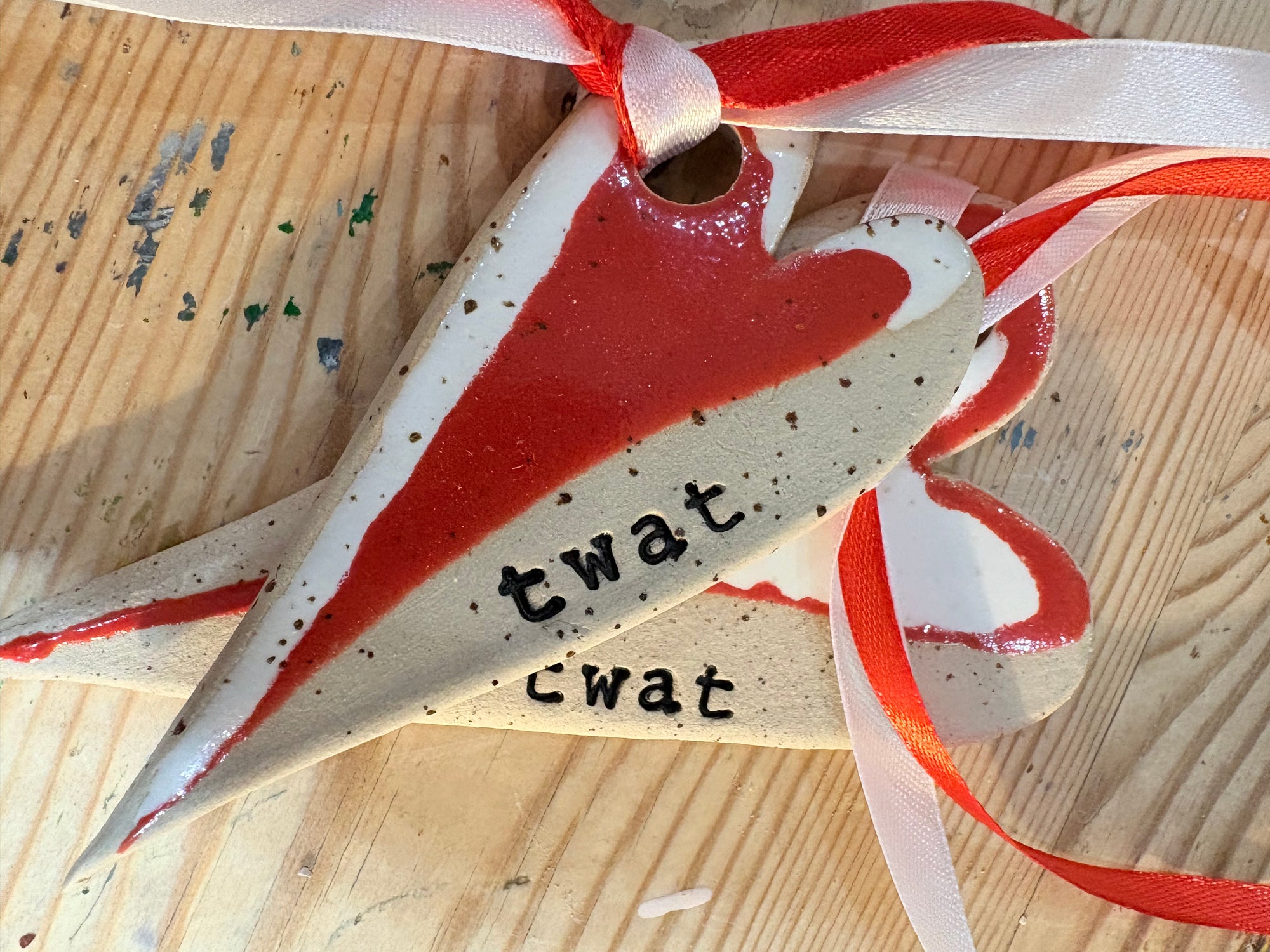 “twat” hanging decoration (red and white, large)