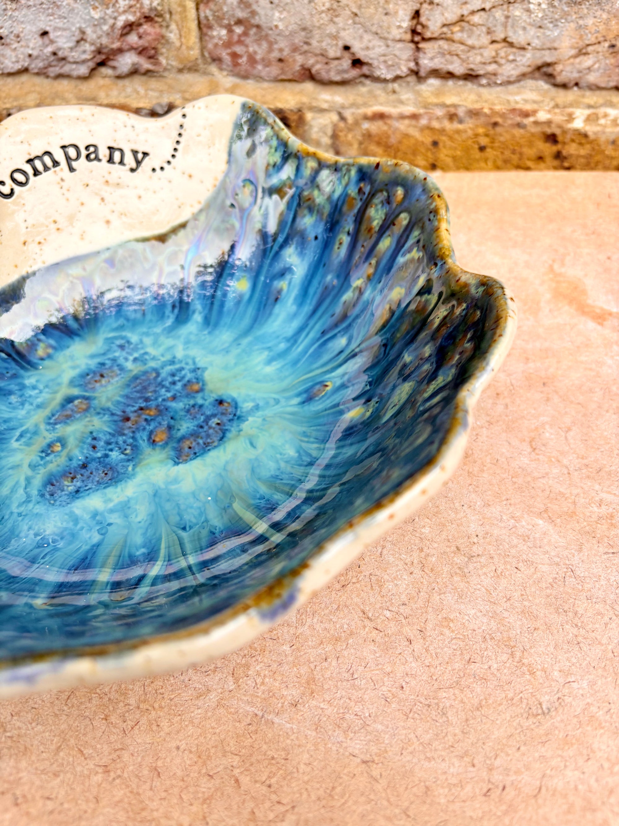 "good food, fine wine, great company..." deep salad/serving dish