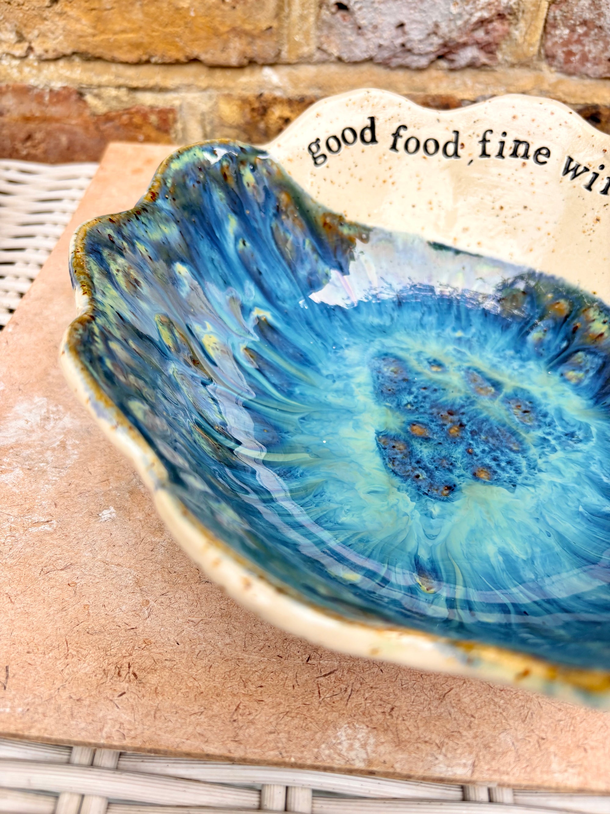 "good food, fine wine, great company..." deep salad/serving dish