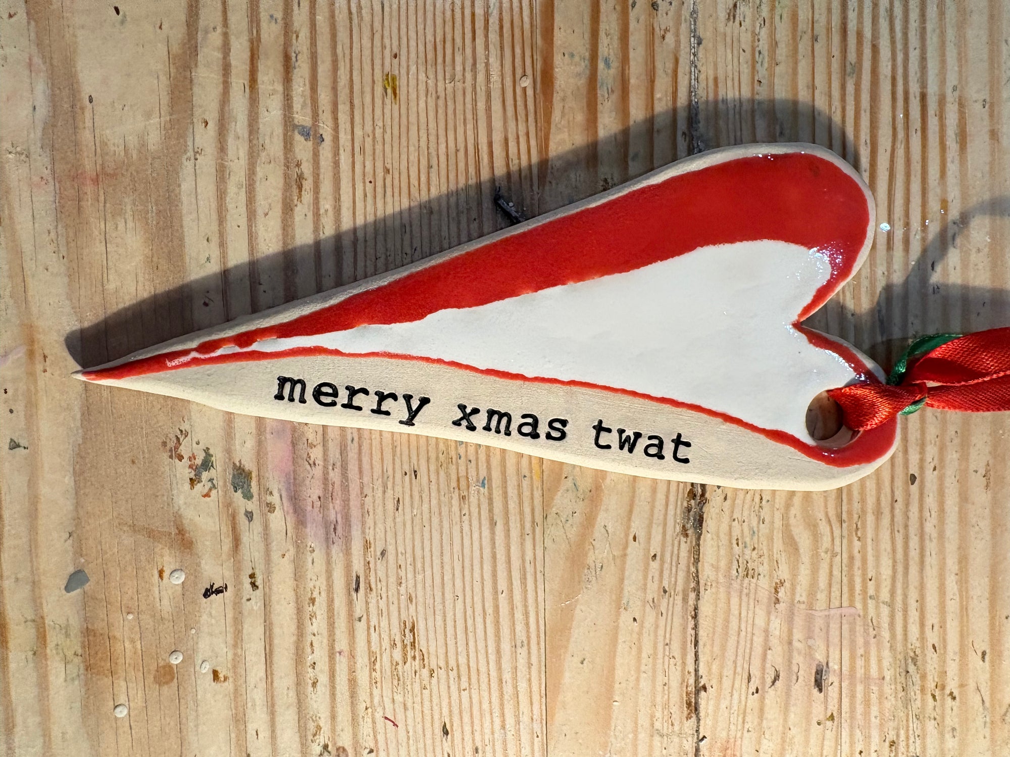 “merry xmas twat” hanging decoration (red and white, large)
