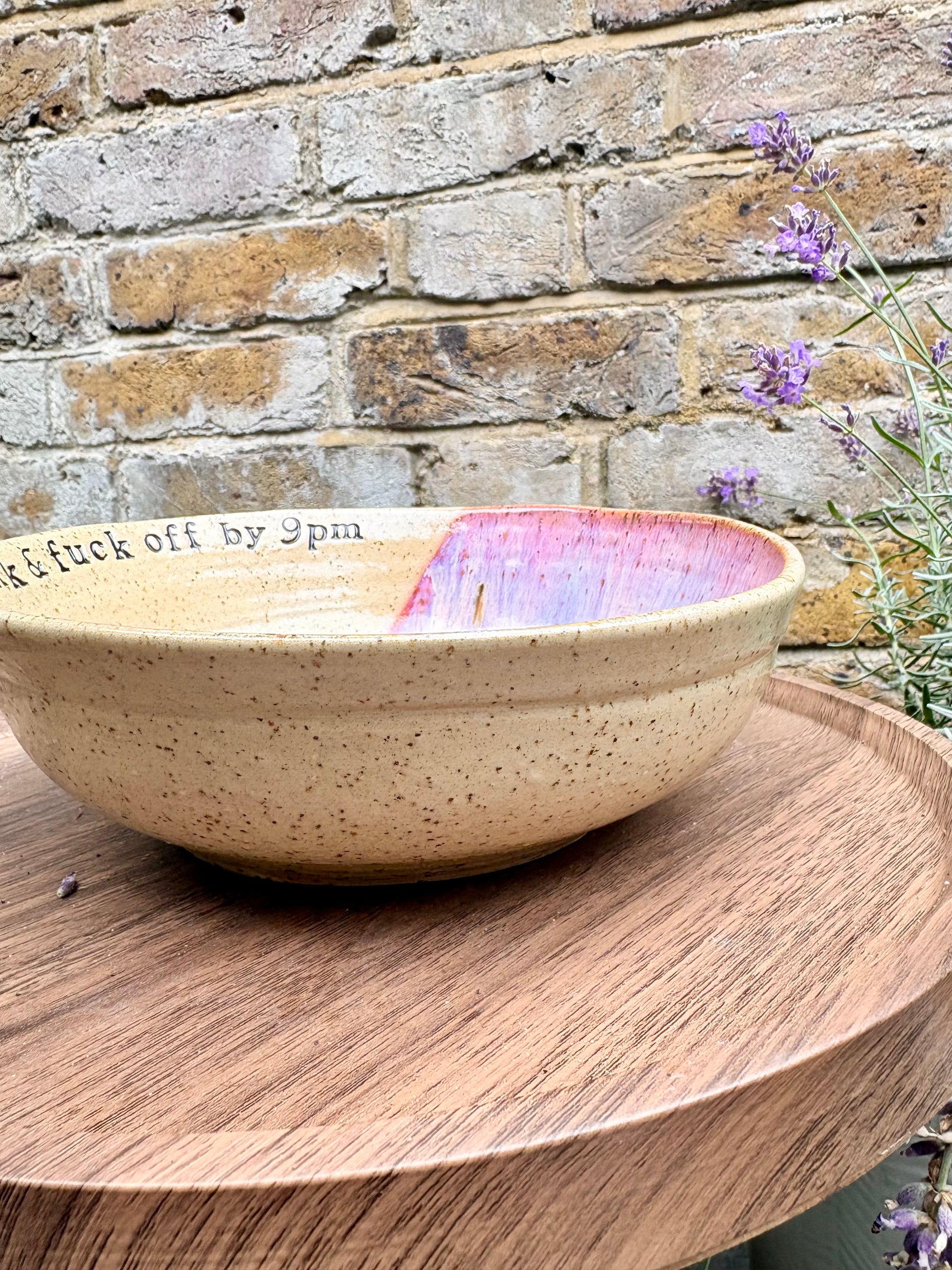 “eat, drink and fuck off by 9pm"  deep round salad/pasta bowl (pink, dark flecked clay)