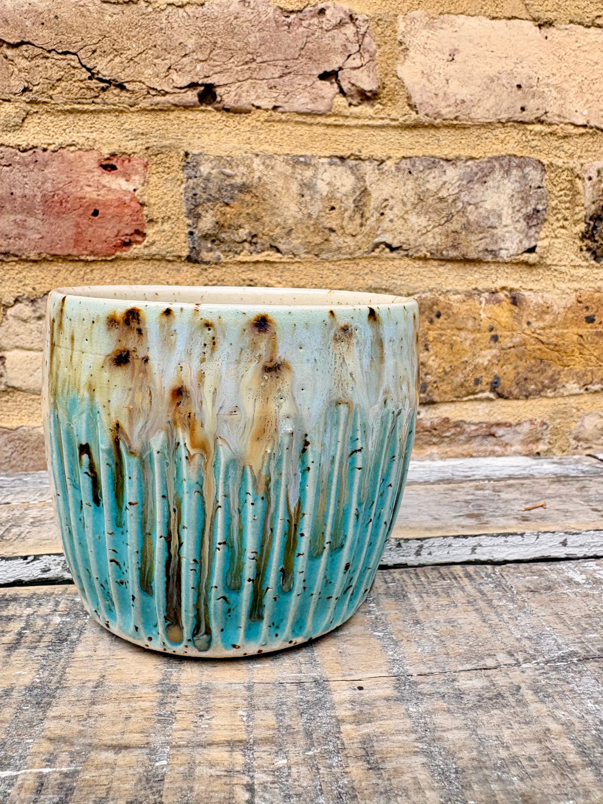 “A book a day keeps reality away" mug (turquoise)