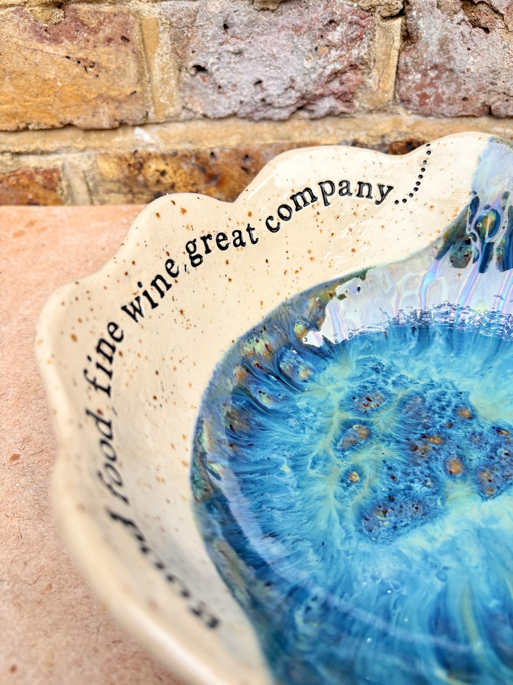 "good food, fine wine, great company..." deep salad/serving dish