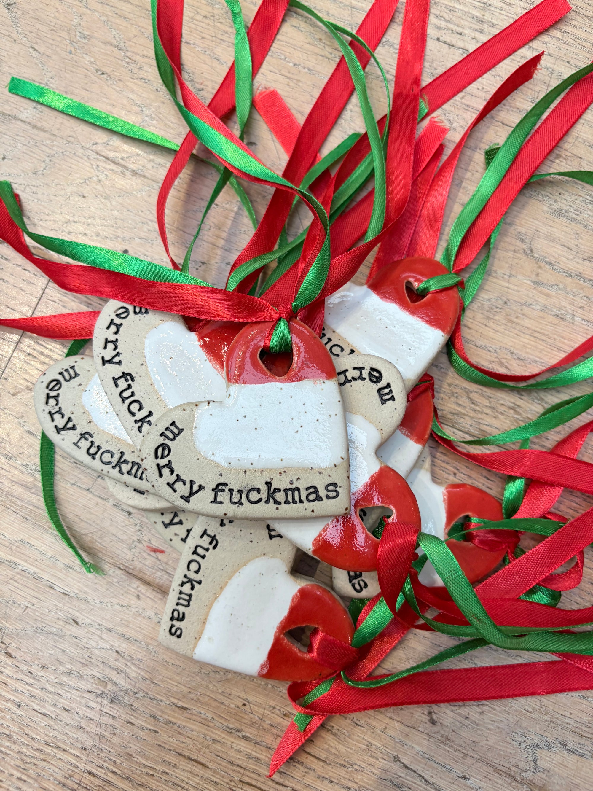 “merry fuckmas” hanging decoration (red and white, large)