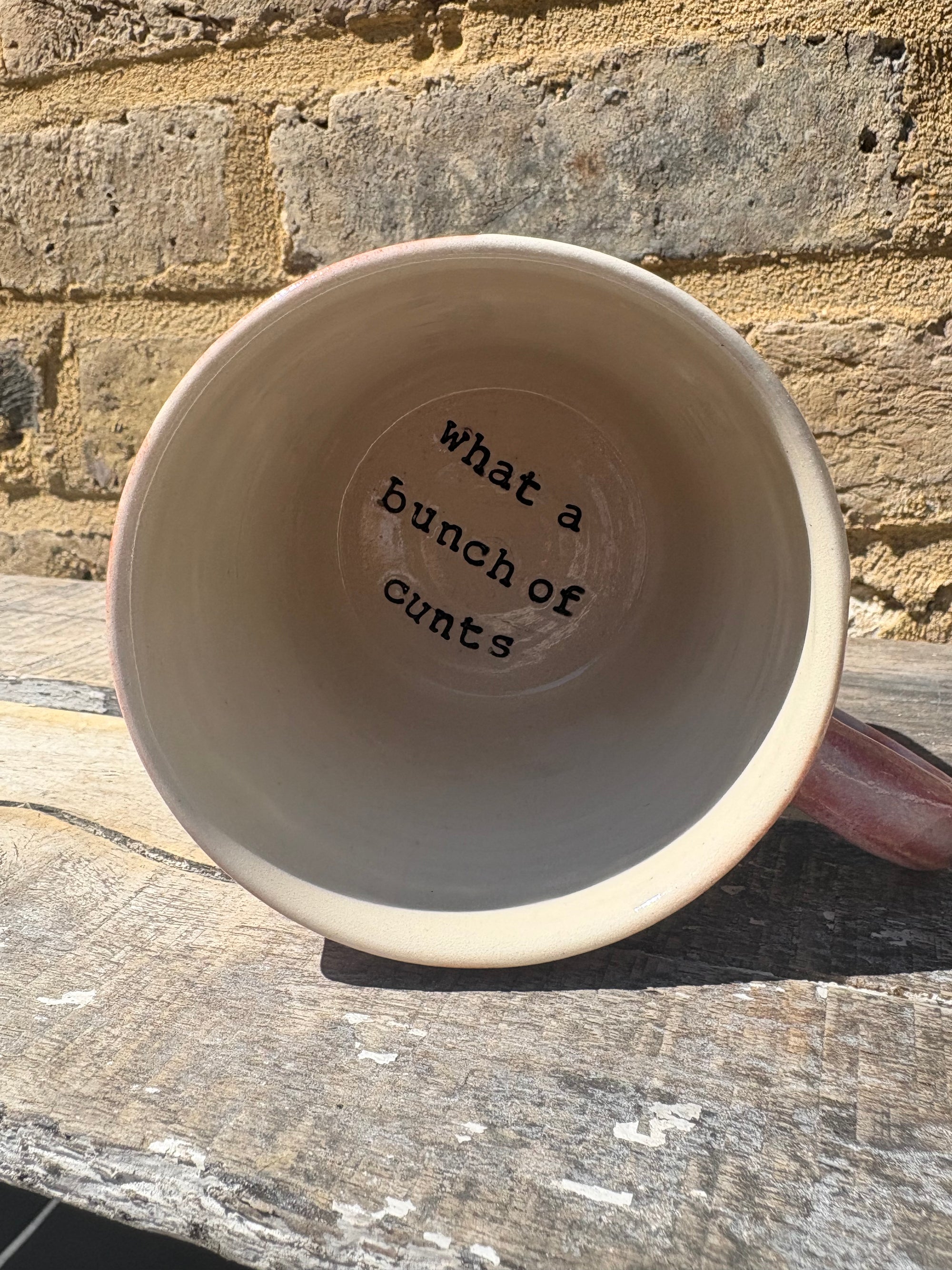 "really happy to be here” "what a bunch of cunts" mug (pink, grooves, 260ml)