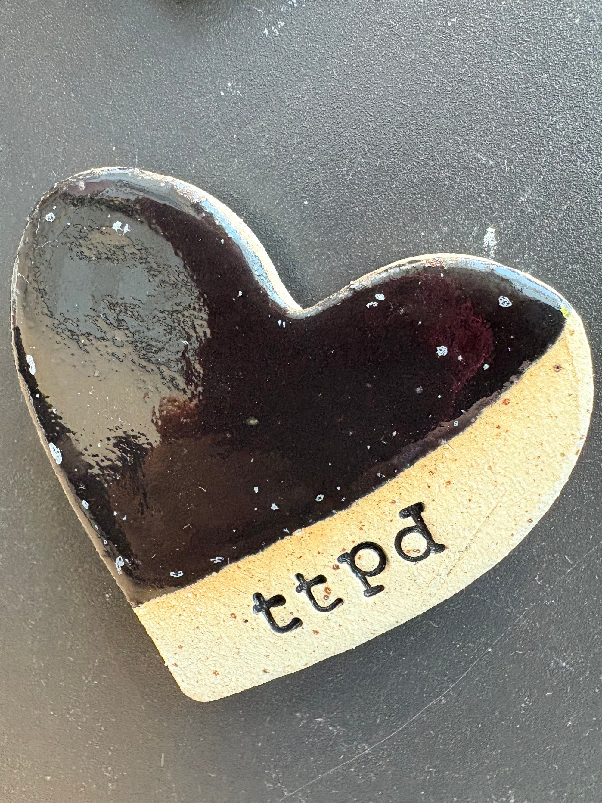 Twelve heart shaped Taylor Swift album magnets