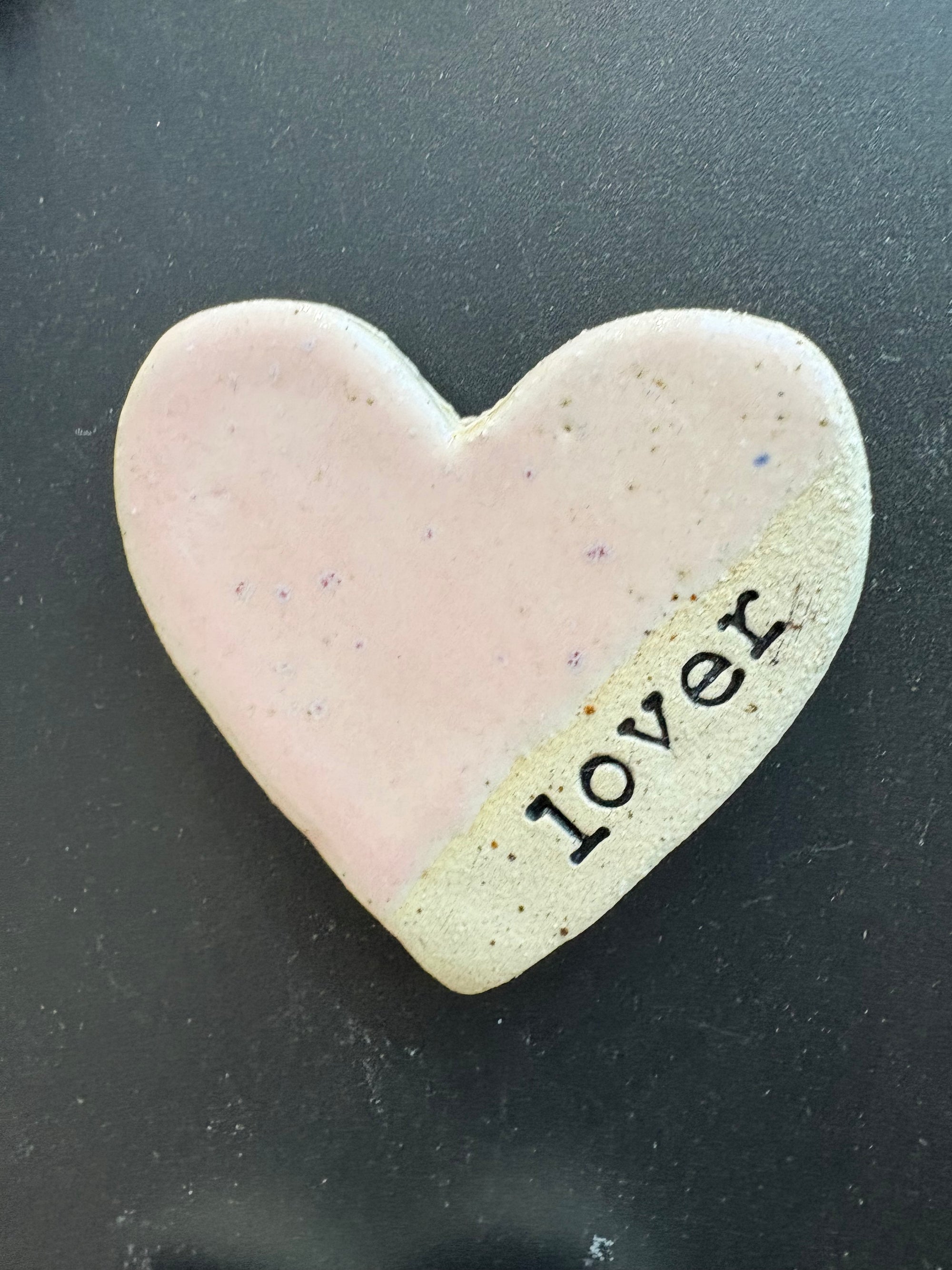 Twelve heart shaped Taylor Swift album magnets