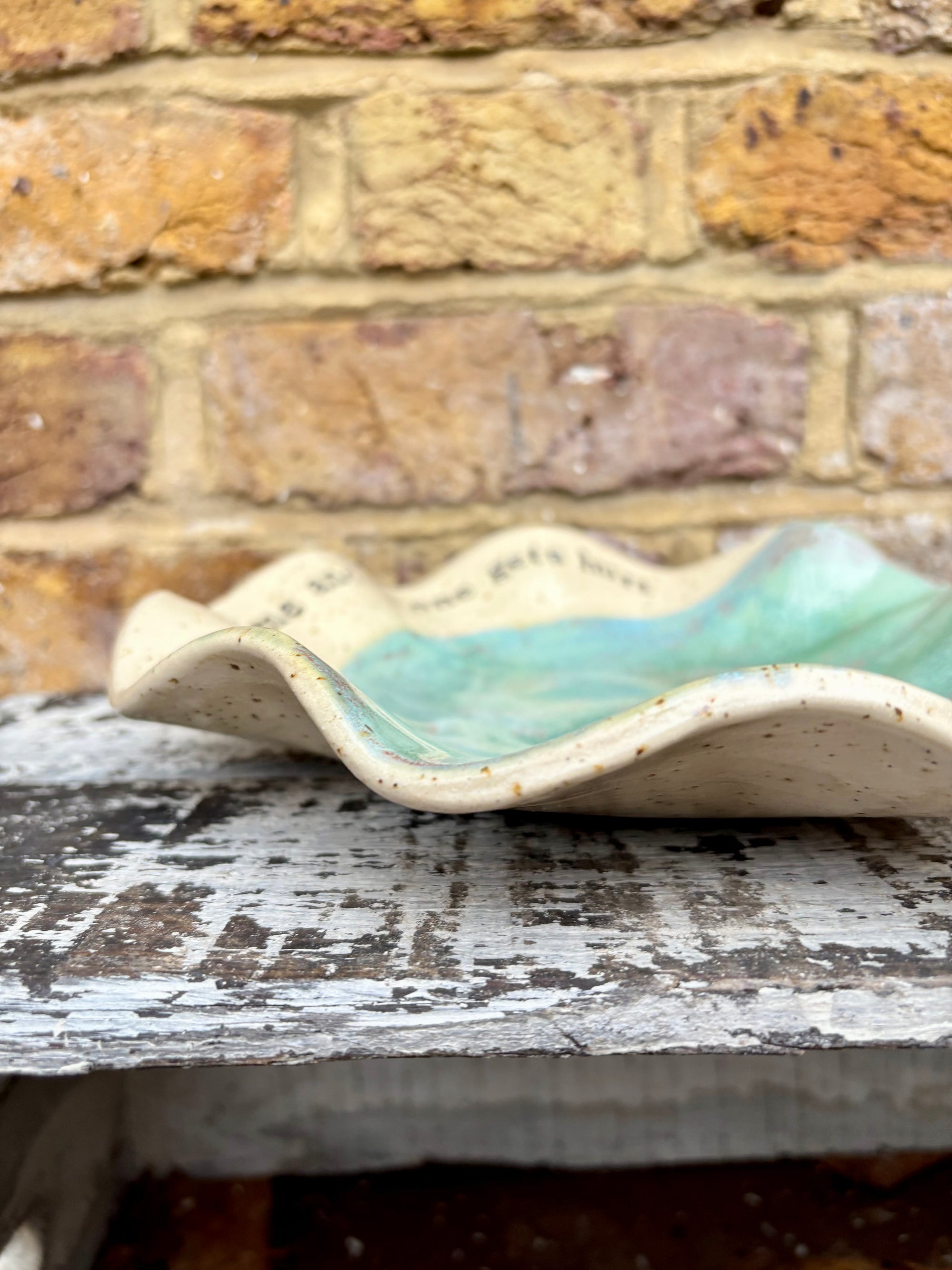 "feed me and no one gets hurt"  serving dish