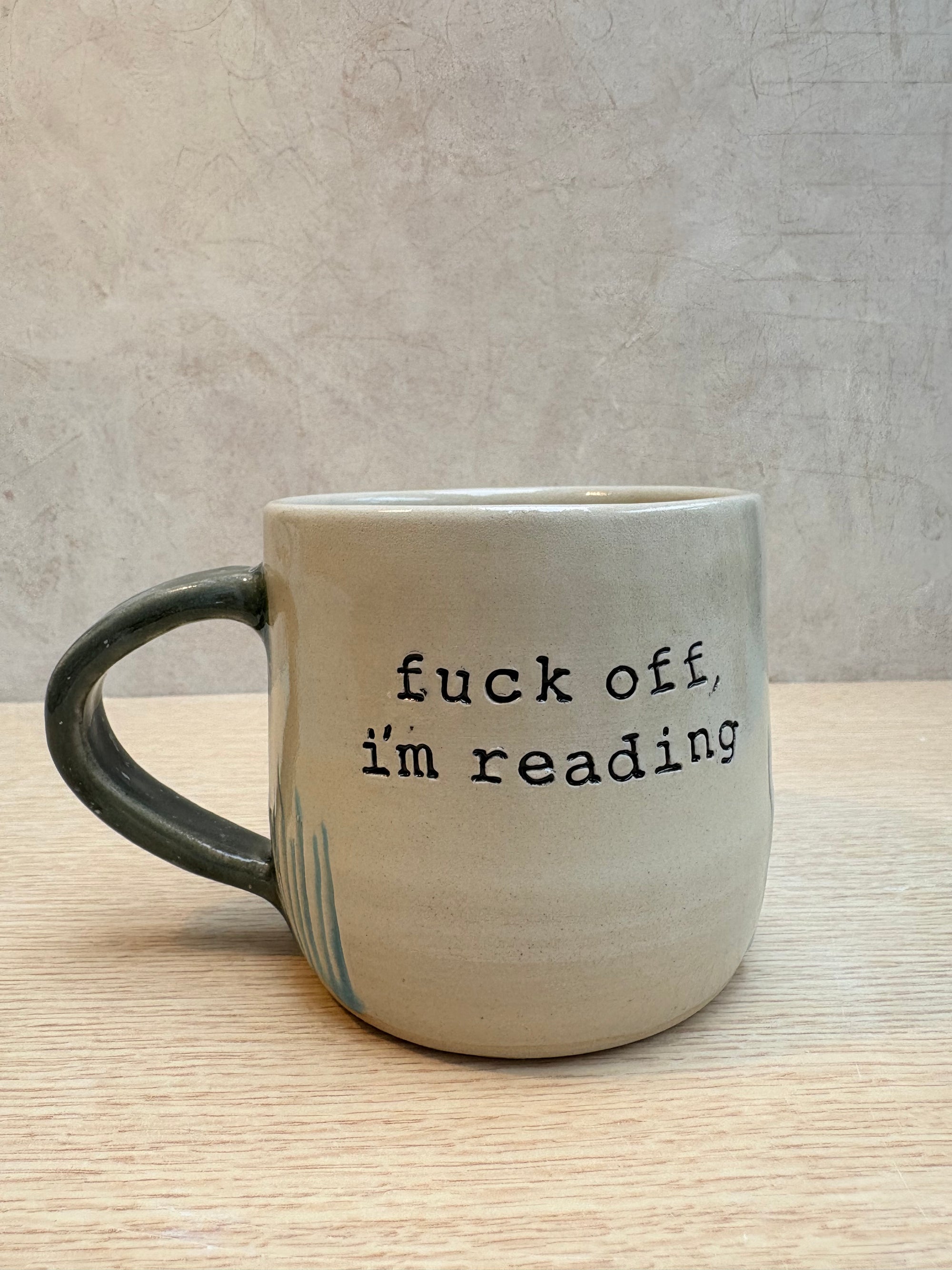 “Fuck off i'm reading" mug (Turquoise Grooves)