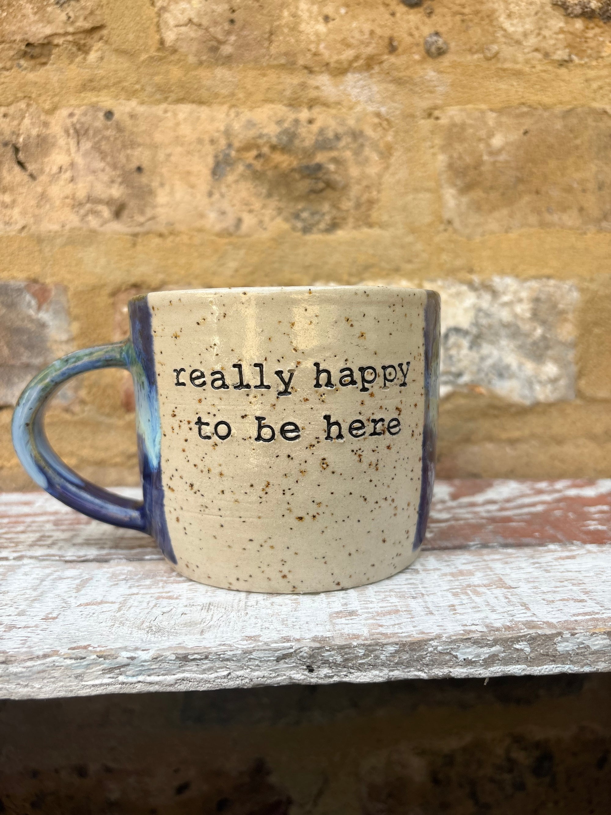 "really happy to be here” "what a bunch of cunts" mug (blue/green)