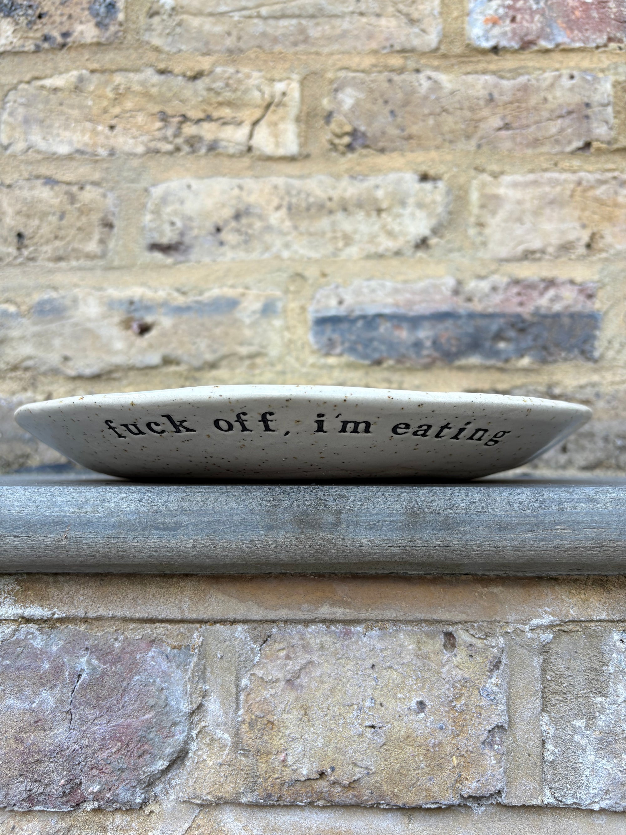 "fuck off, i'm eating" dinner plate