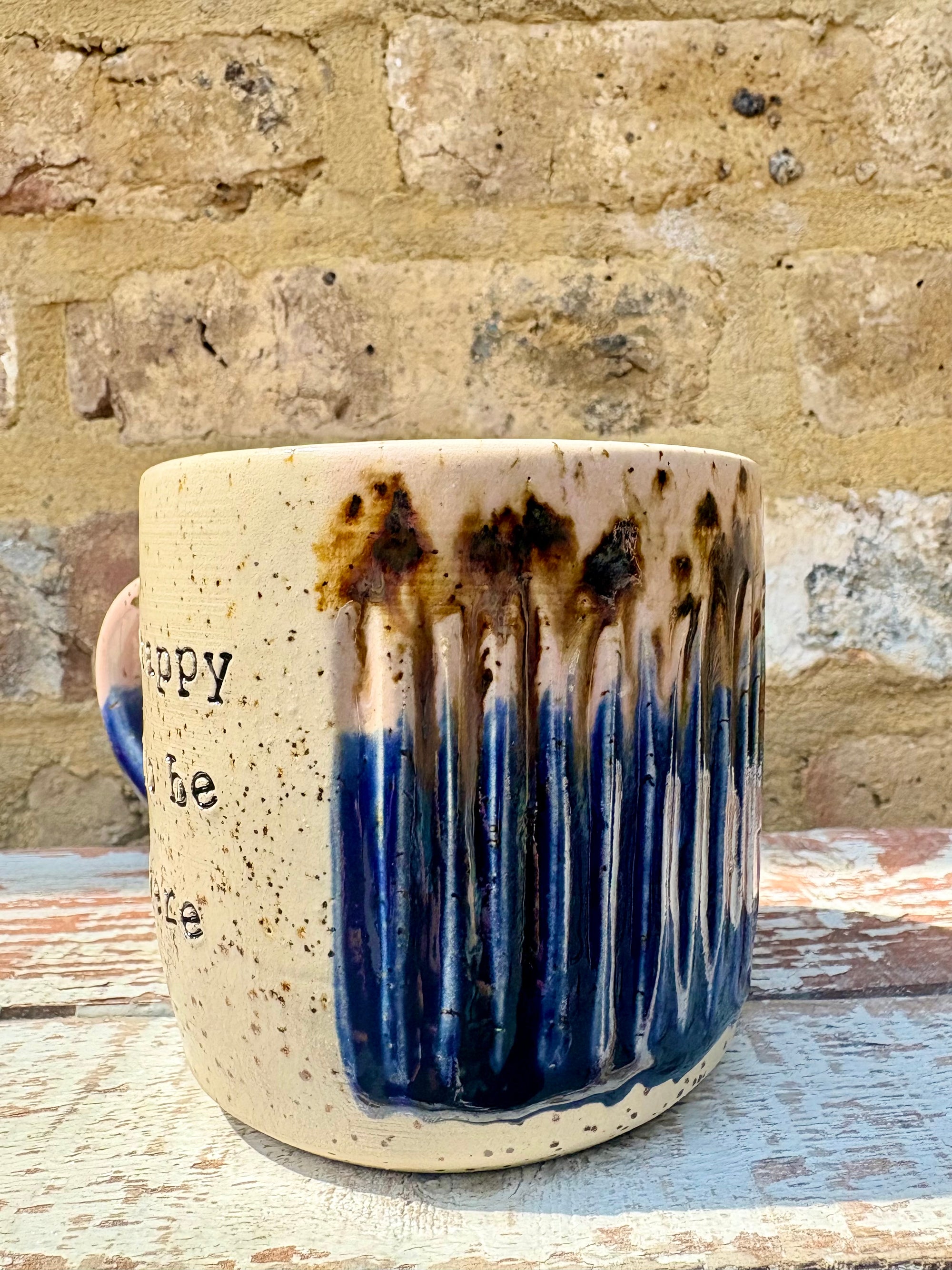 "happy to be here” "what a bunch of cunts" mug (pink/blue, grooves)
