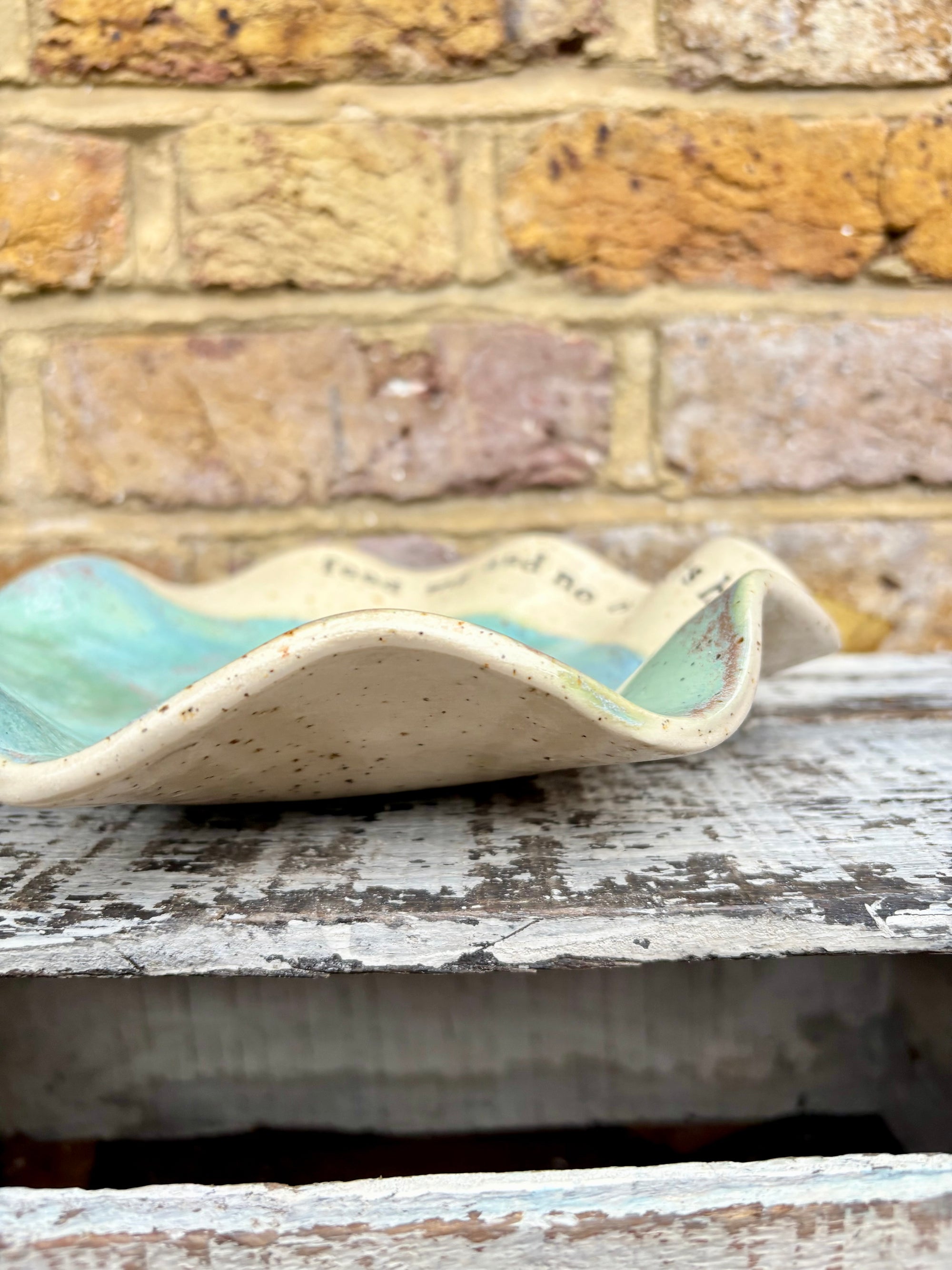 "feed me and no one gets hurt"  serving dish