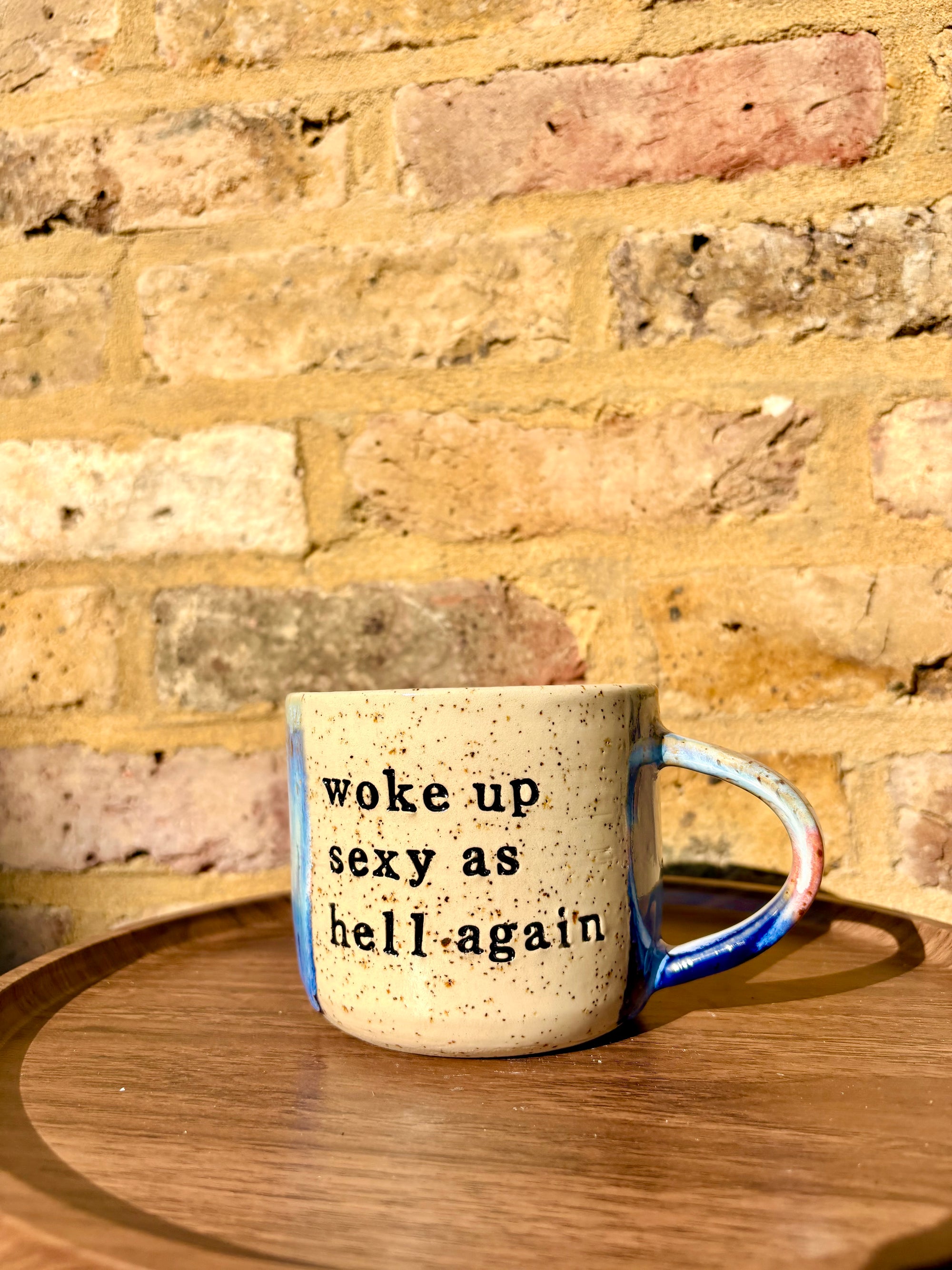 “woke up sexy as hell again” mug