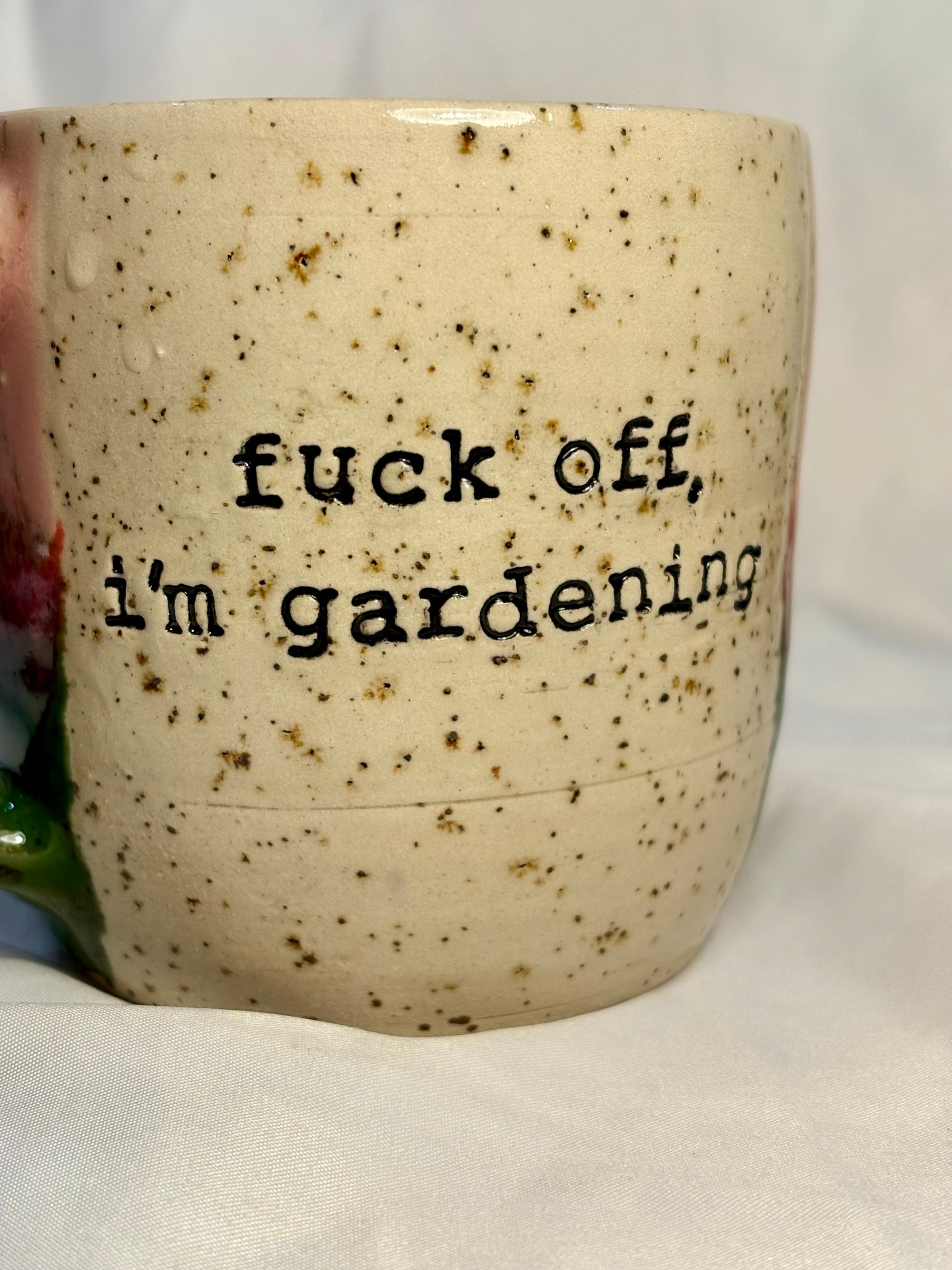 “Fuck off, i'm gardening" mug (pink/green)