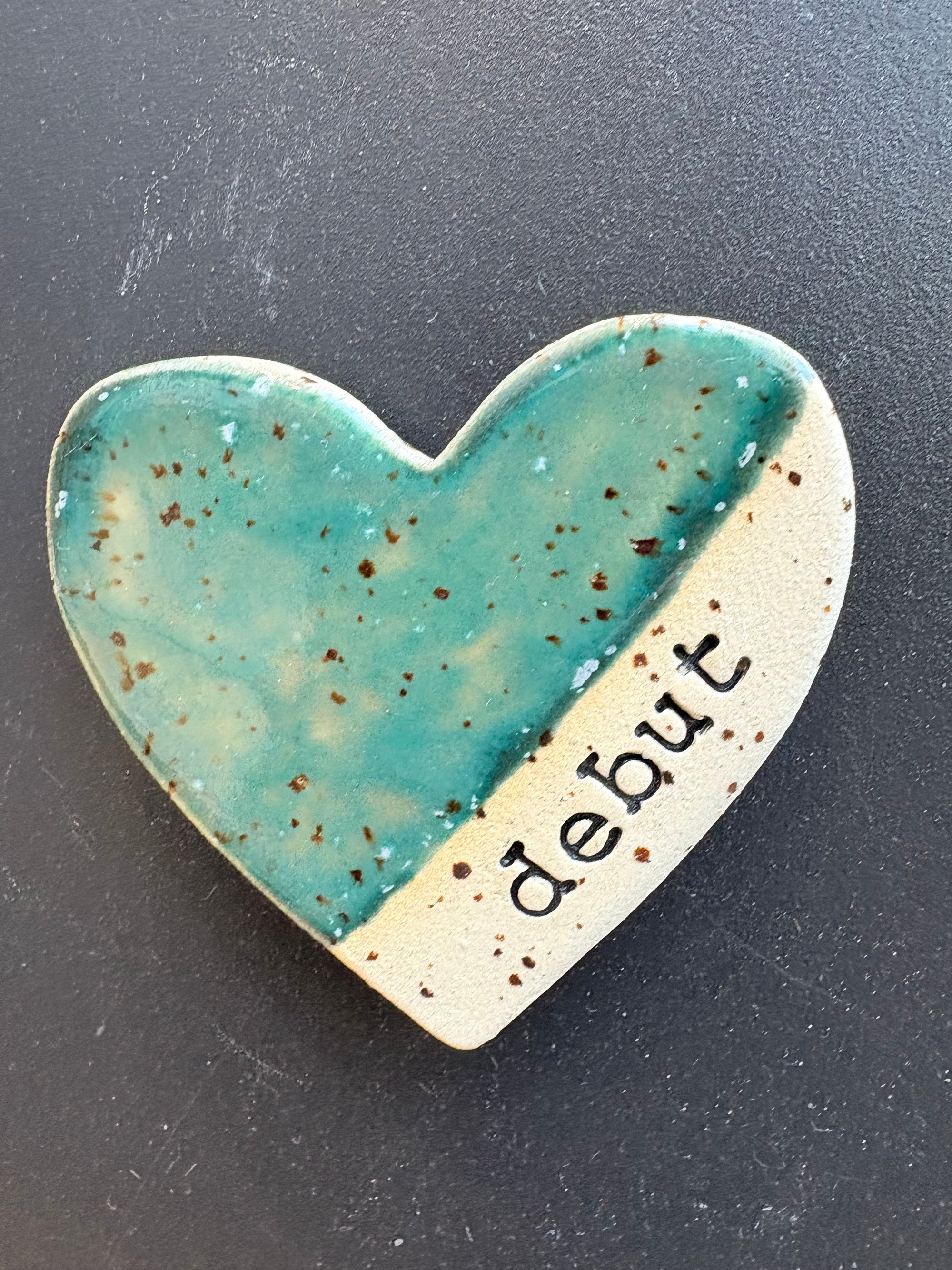 Twelve heart shaped Taylor Swift album magnets