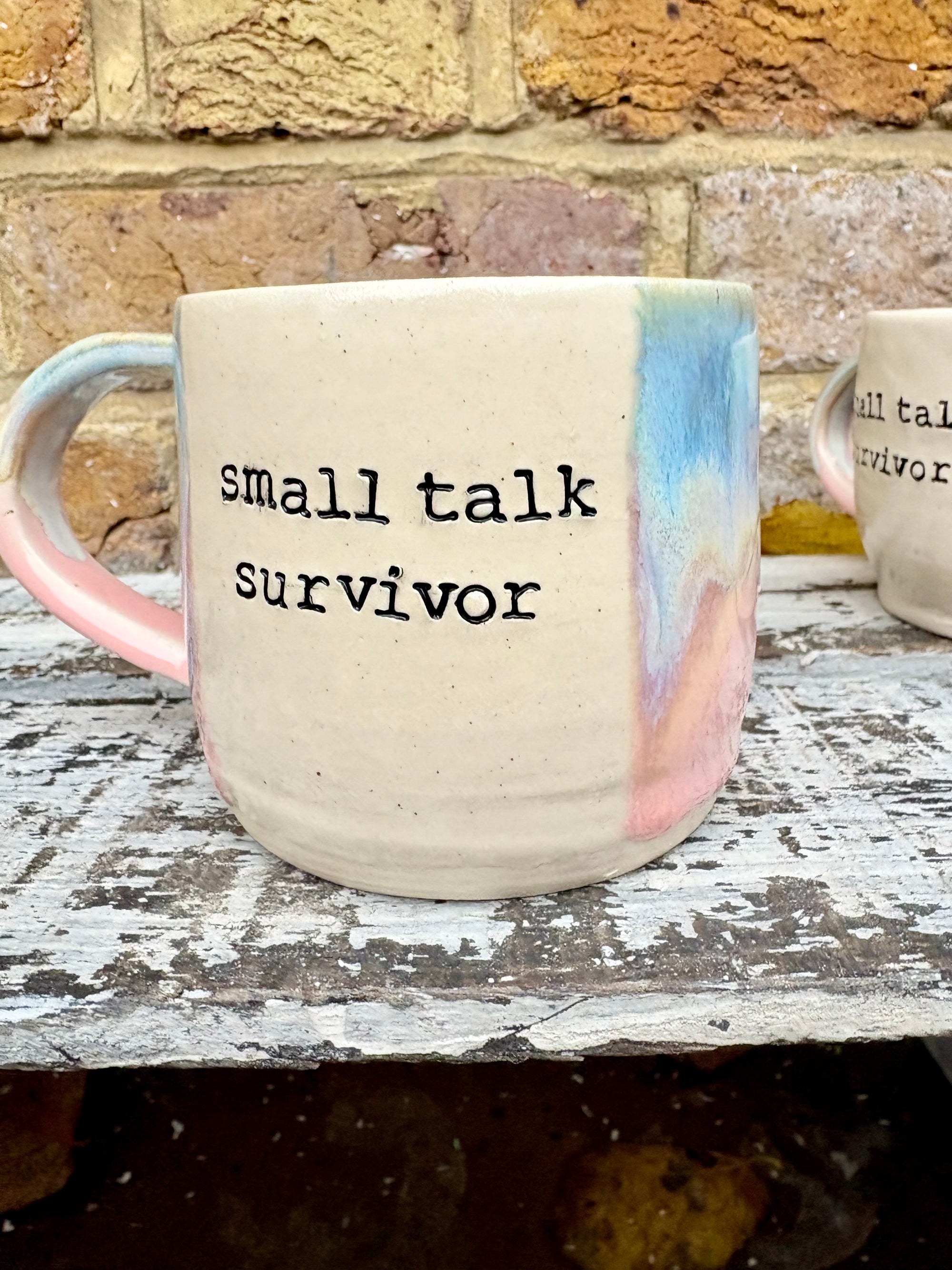 Small Talk Survivor mug (pinks and blue)