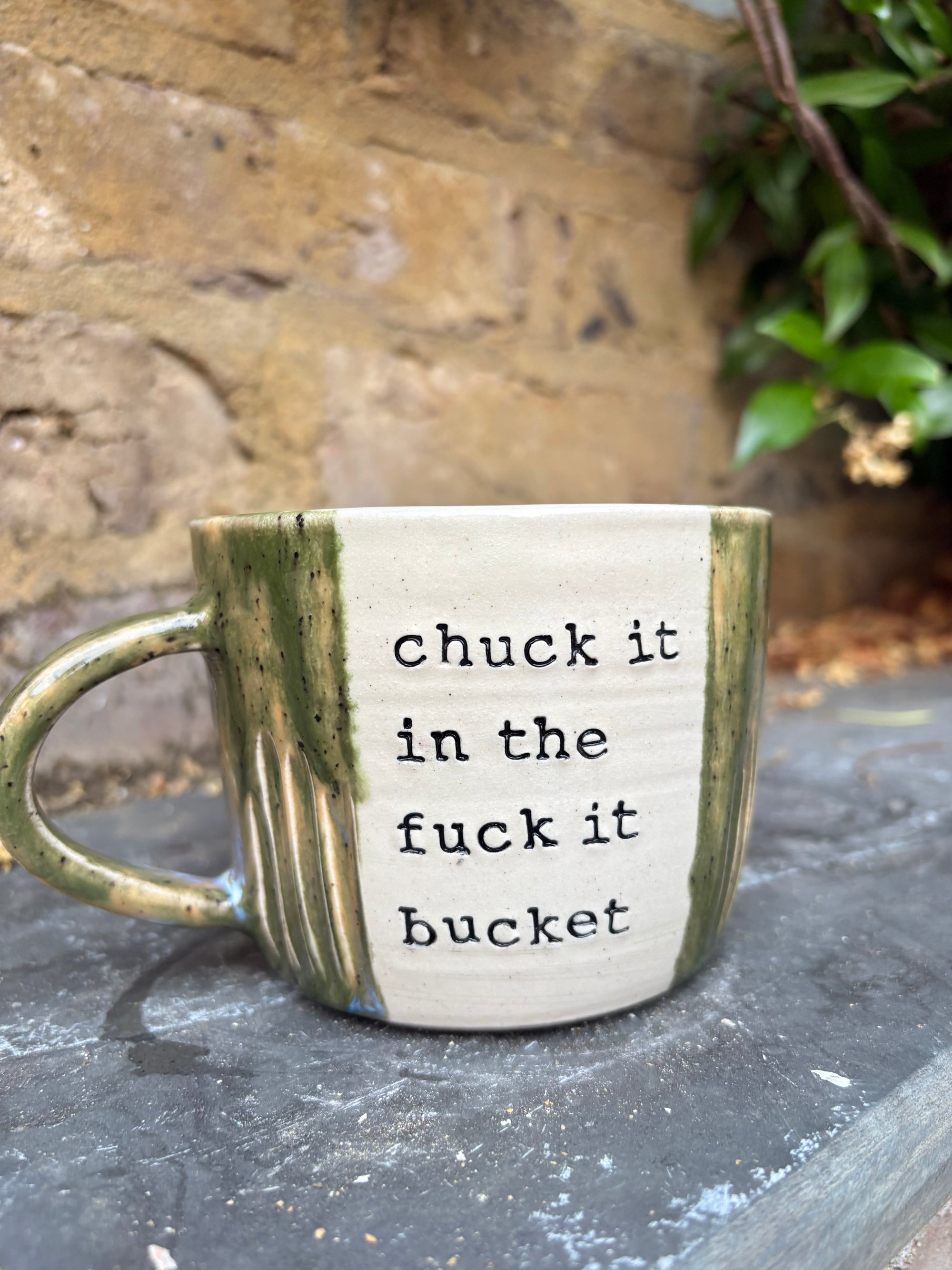 “chuck it in the fuck it bucket" mug (green speckle, 380ml)