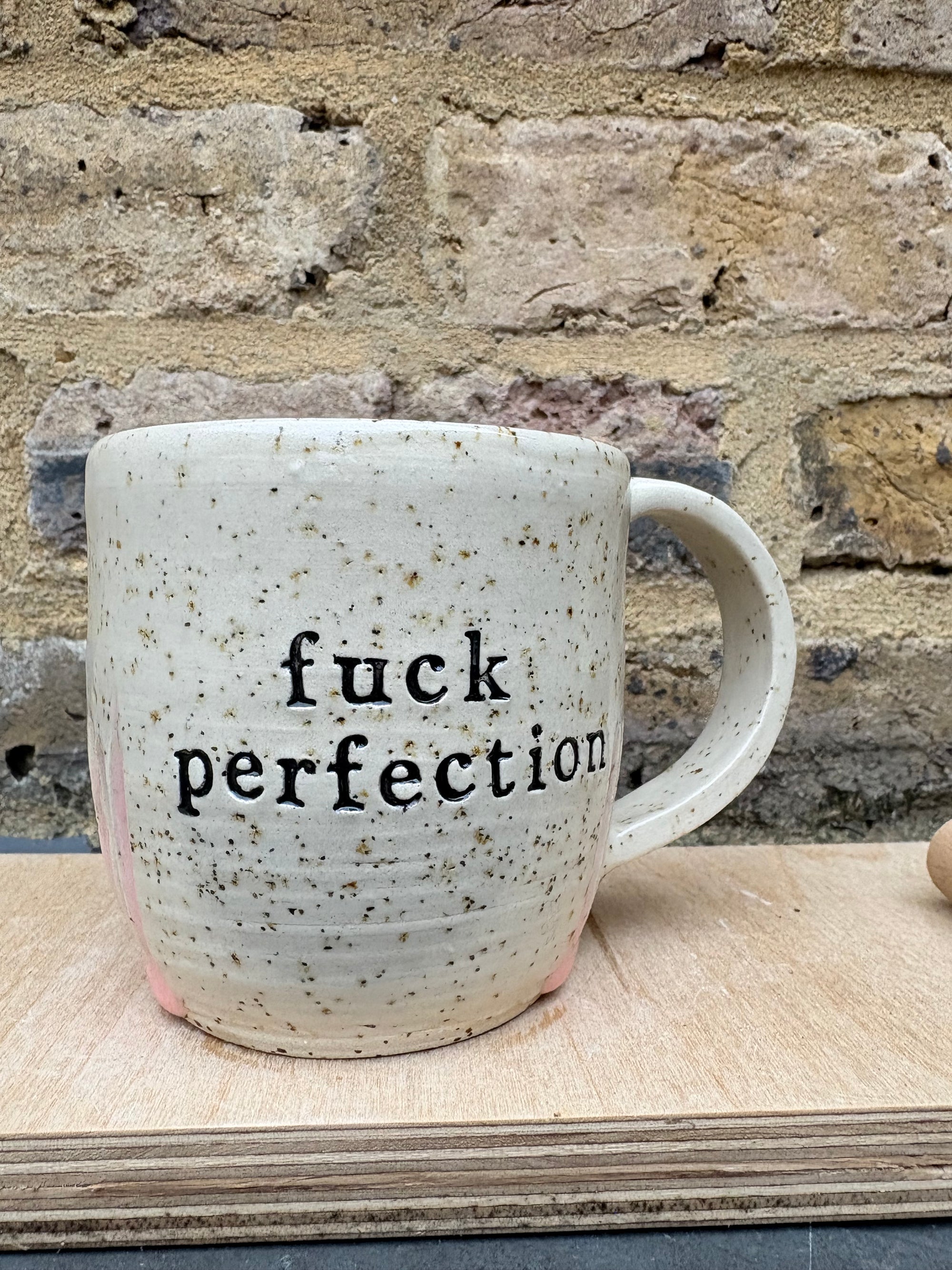 “fuck perfection" mug (pale pink grooves)