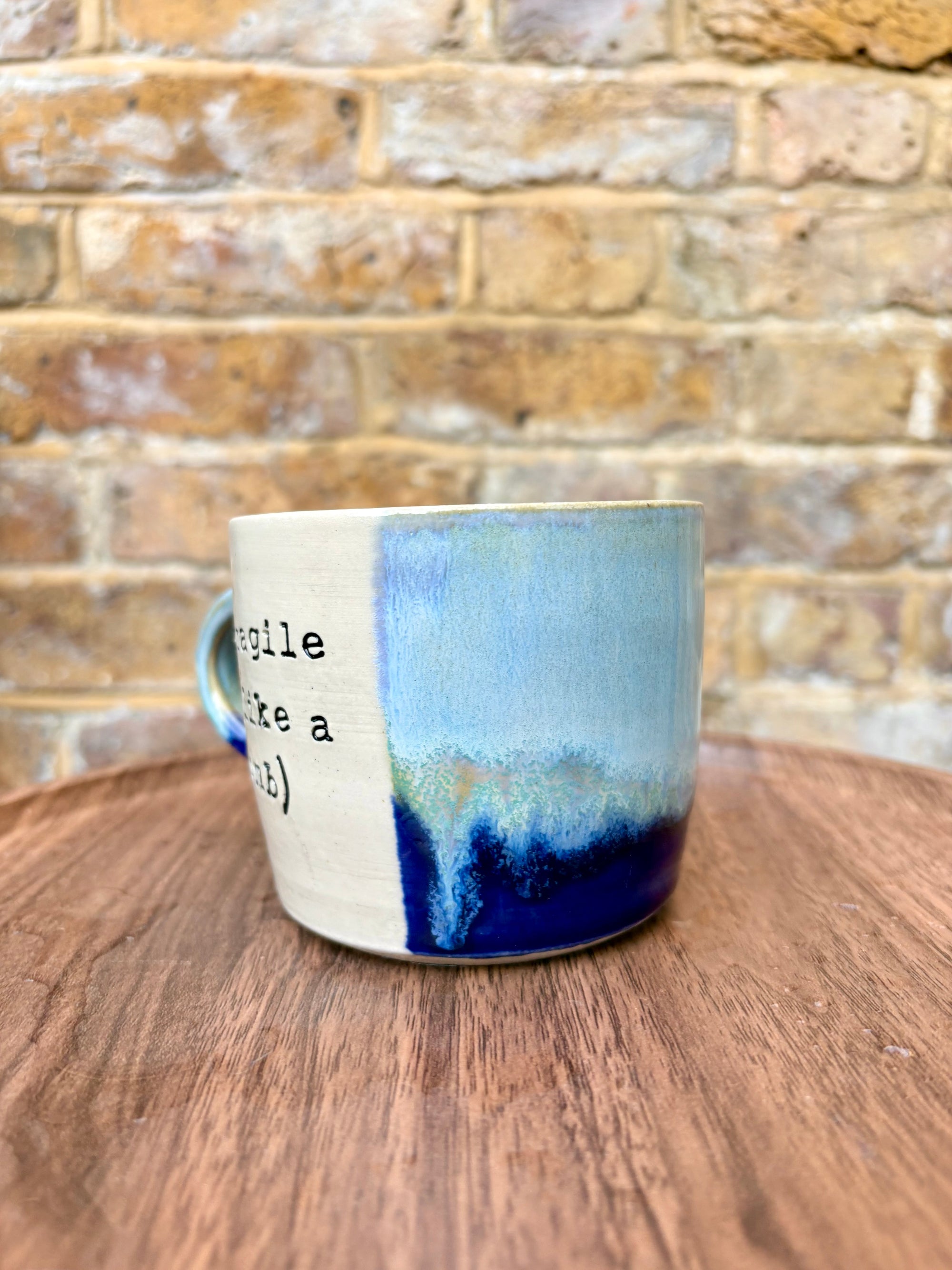 “fragile (like a bomb) mug (blue)