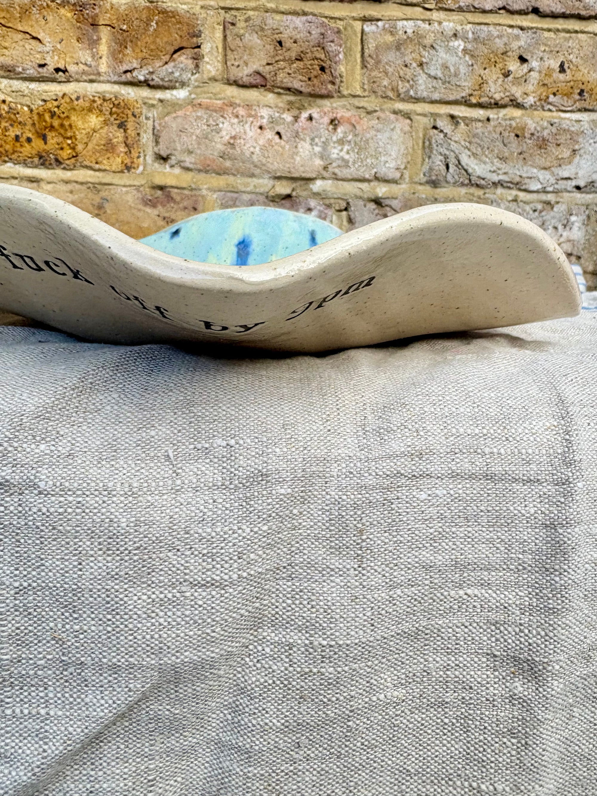 "good food, fine wine, great company..." serving dish