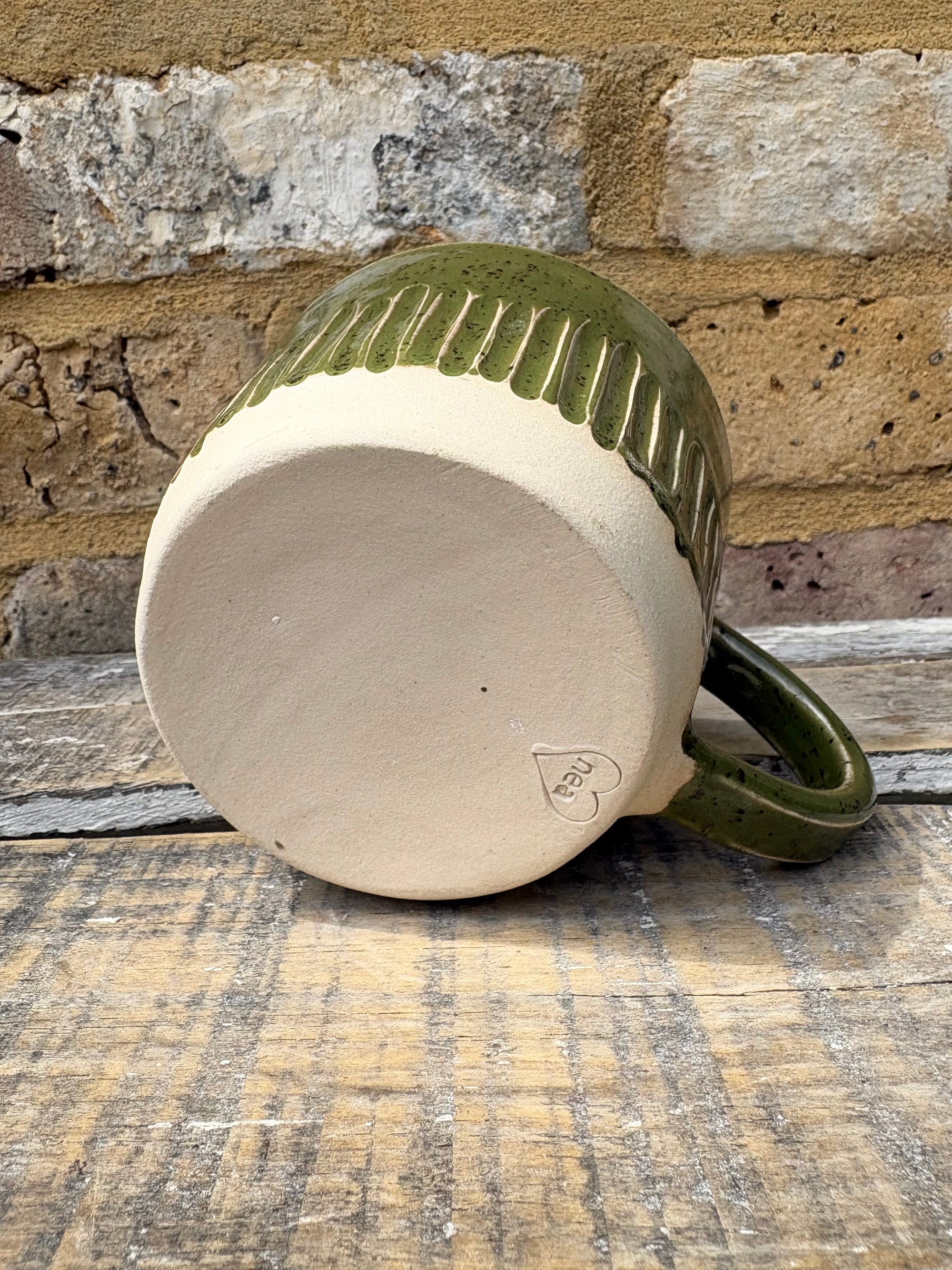 "menopausal and fresh out of fucks" mug (speckled green)