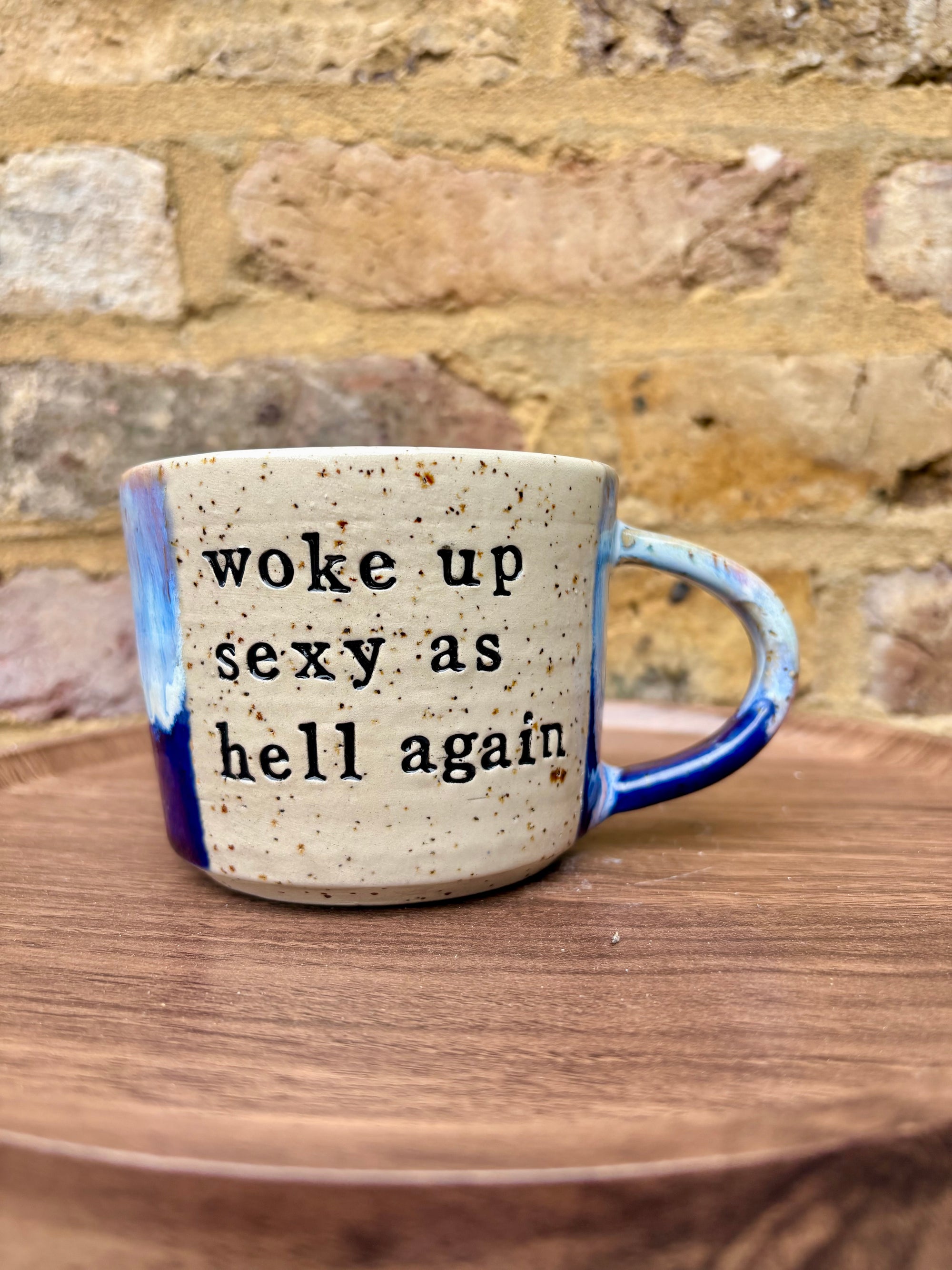 “woke up sexy as hell again” mug (flecked, pink night sky)