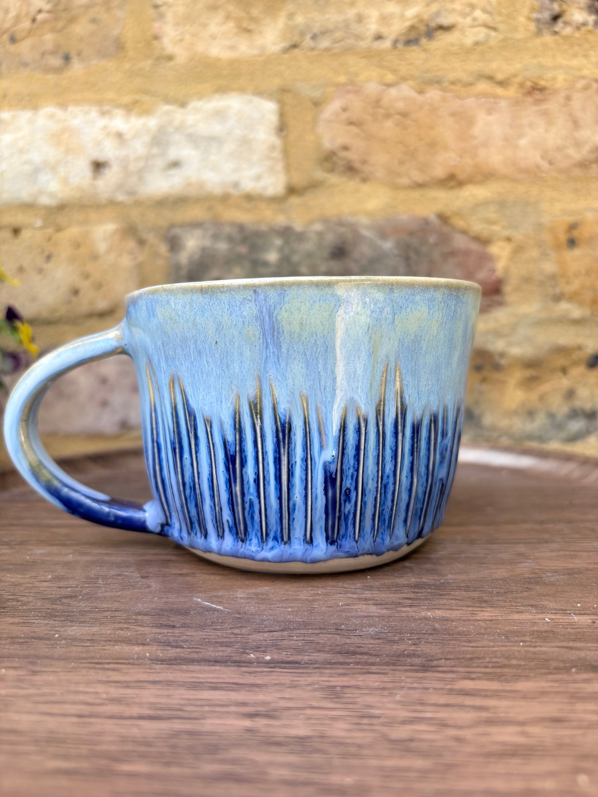"cunt off fuck face” mug (blue, grooves)