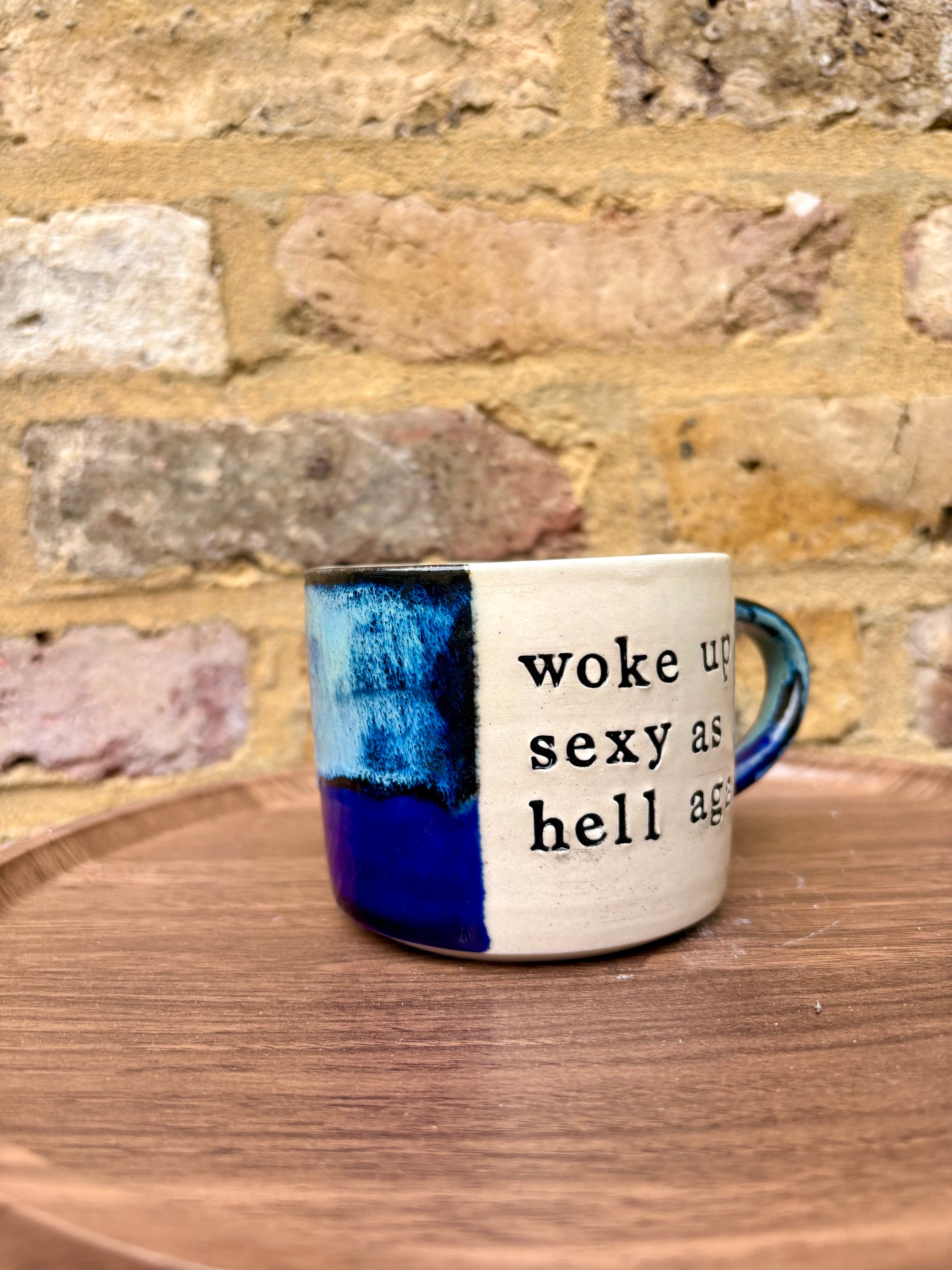 “woke up sexy as hell again” mug (blue shore)