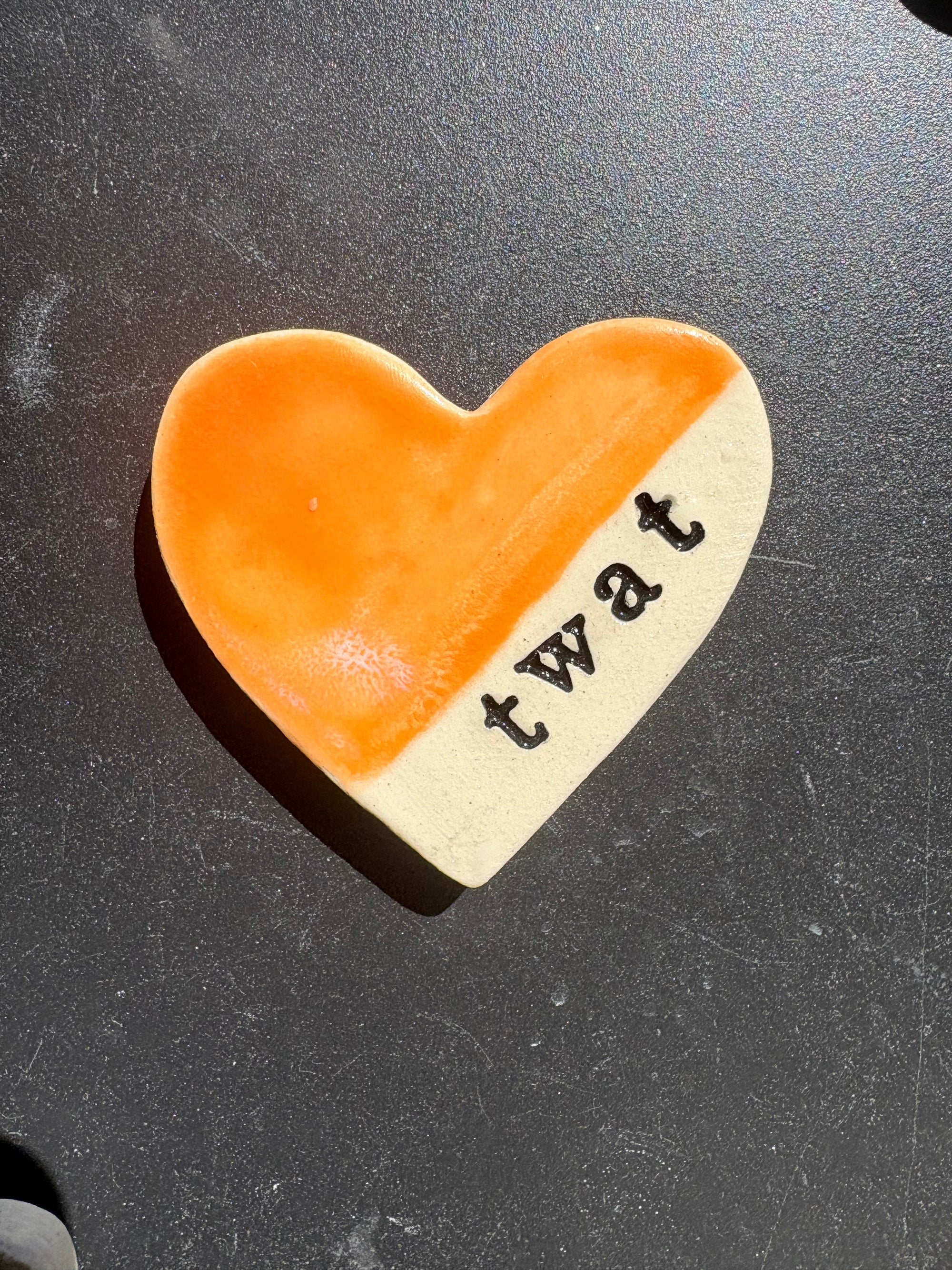 “twat" magnet (orange, large)