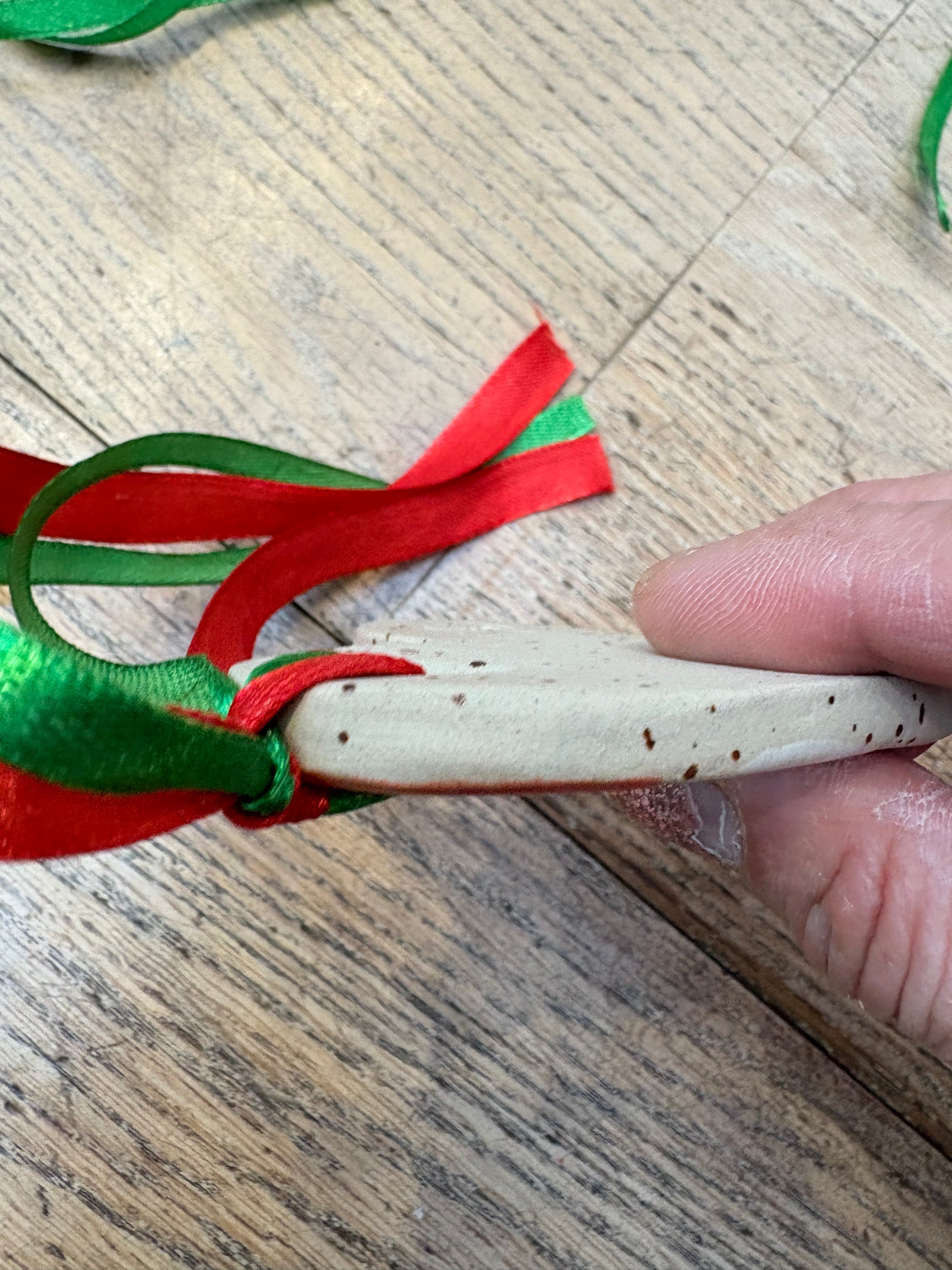 “merry fuckmas” hanging decoration (red and white, large)