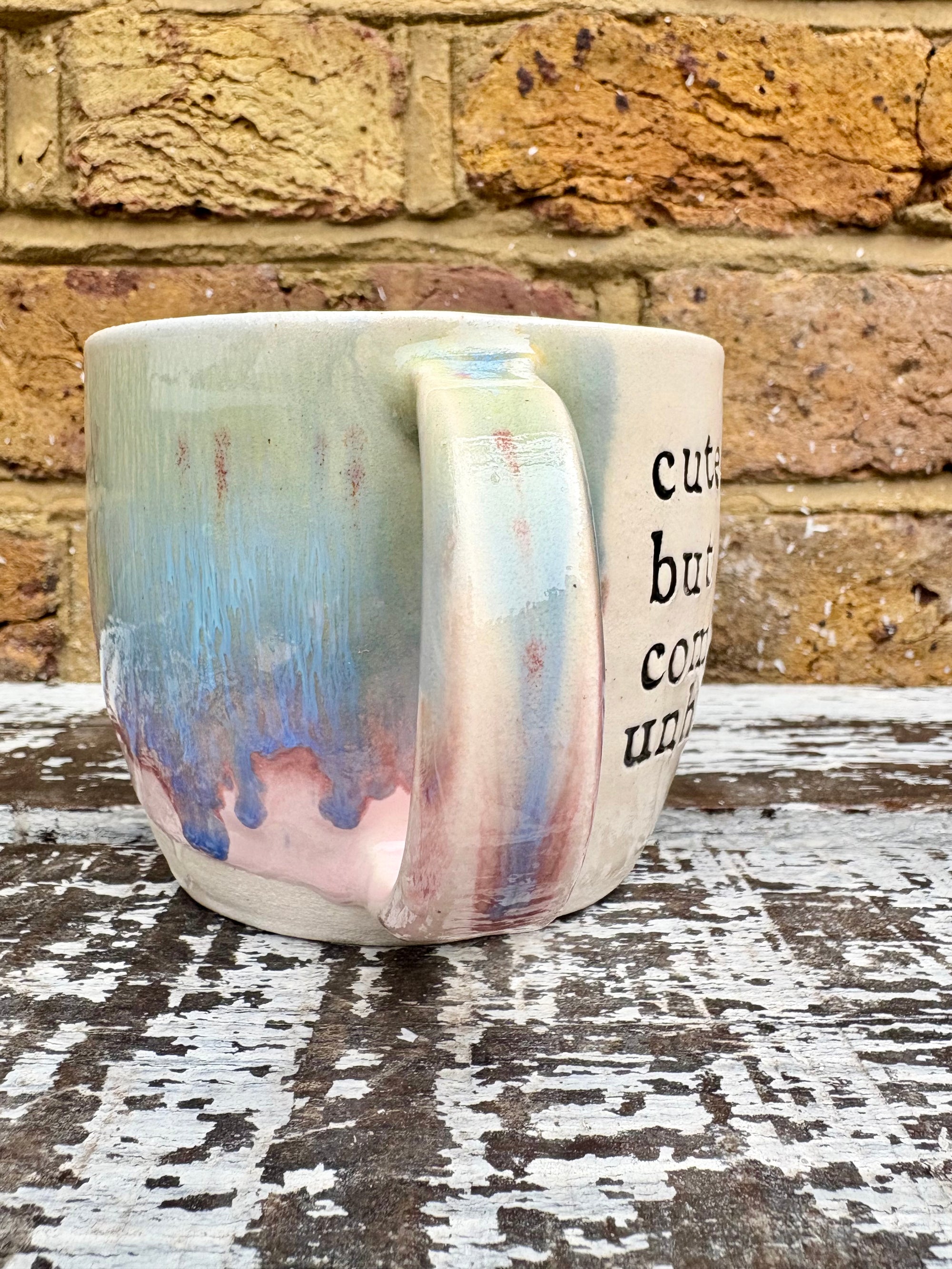 "cute but completely unhinged" mug