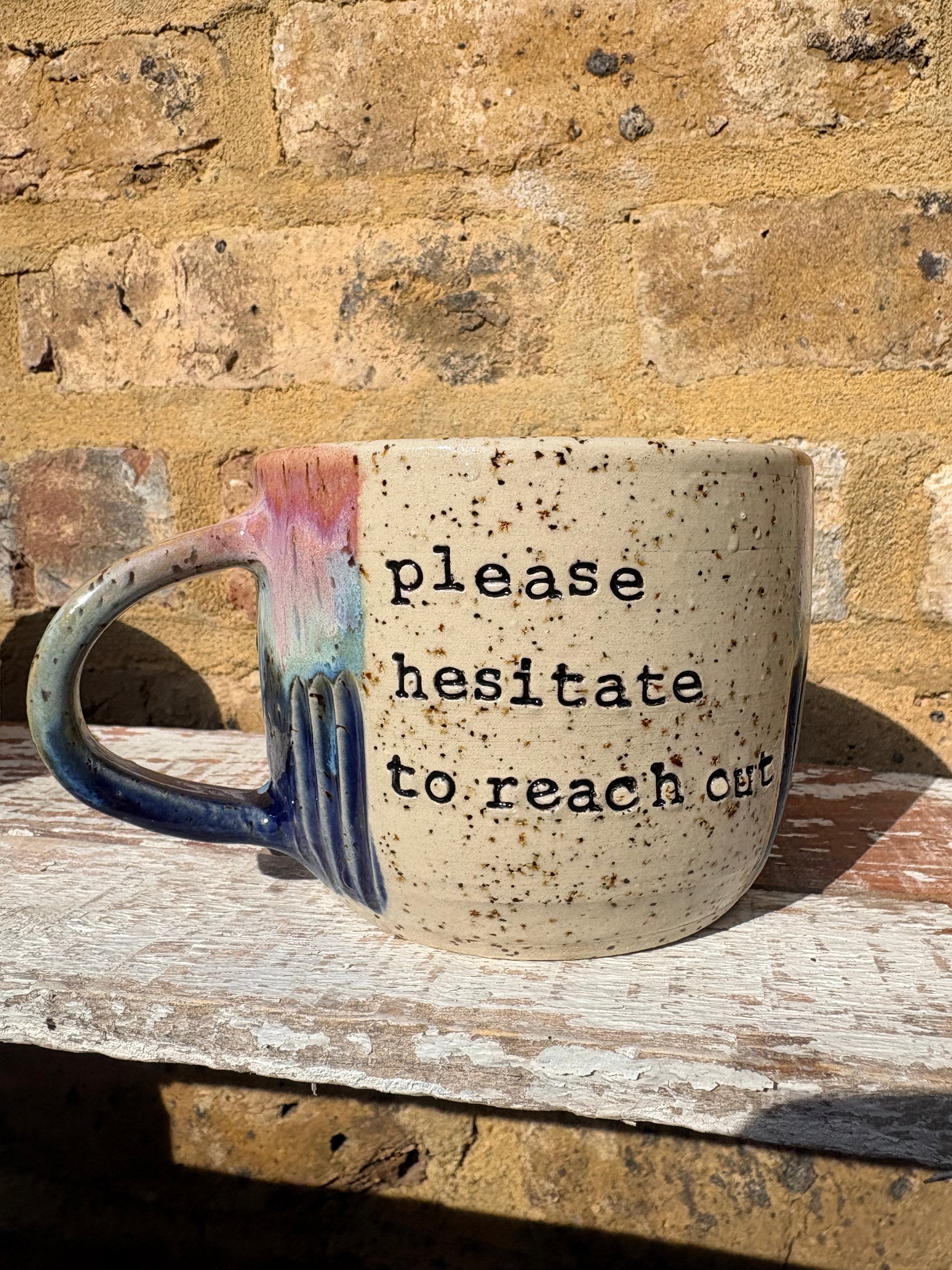 "please hesitate to reach out" mug (pink night sky)