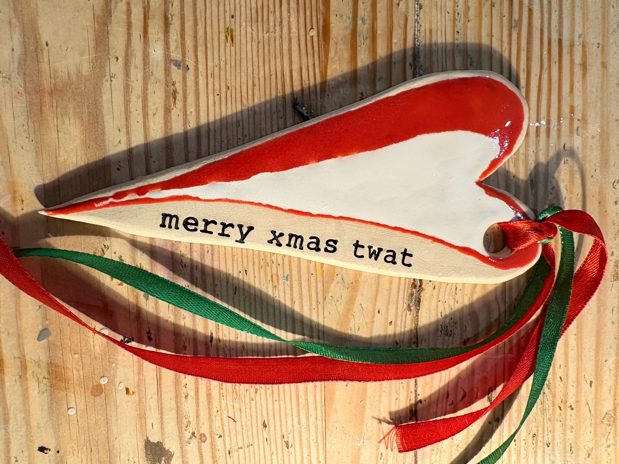 “merry xmas twat” hanging decoration (red and white, large)