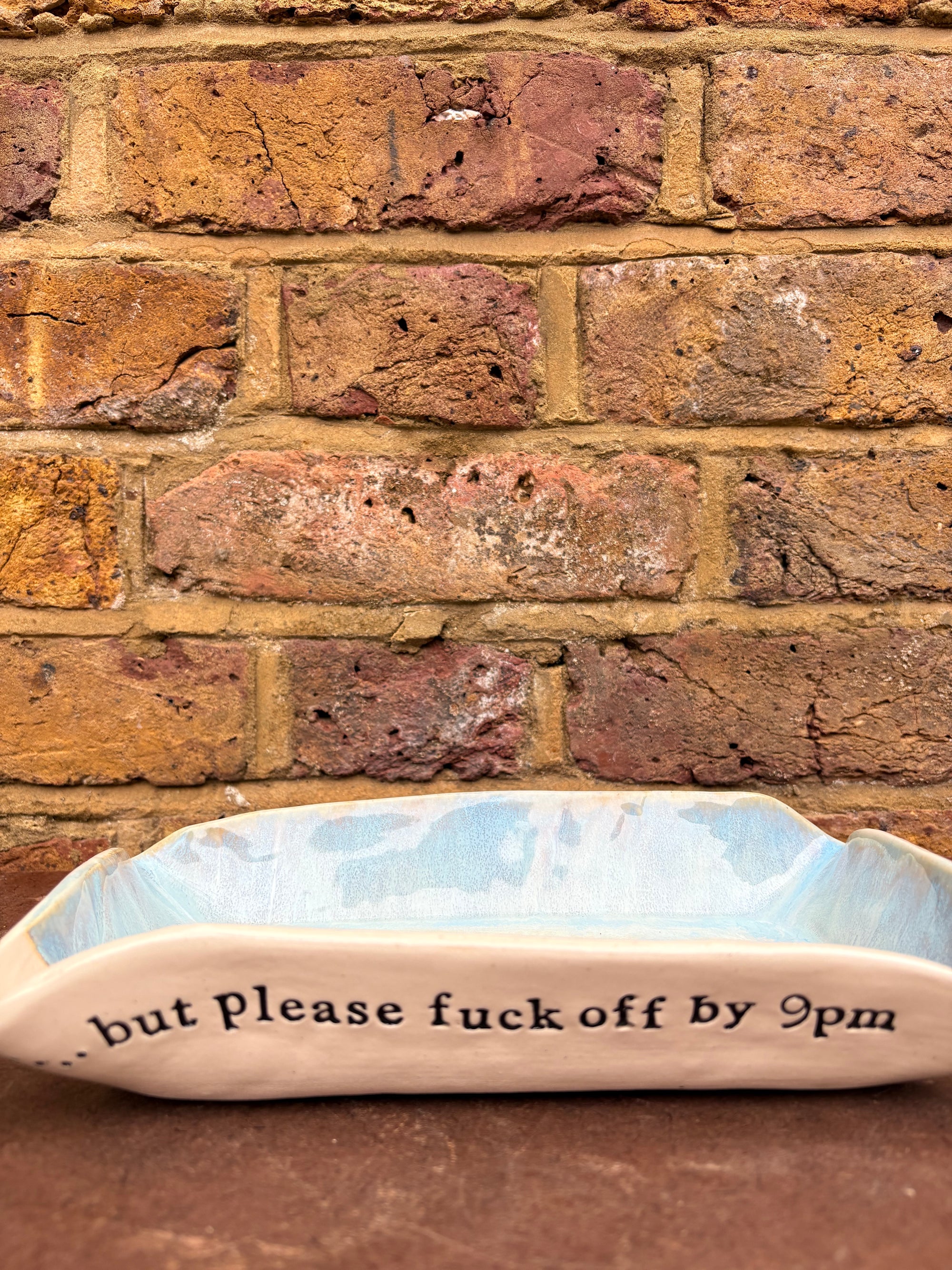 “good food, fine wine, great company..." rectangular salad/serving dish