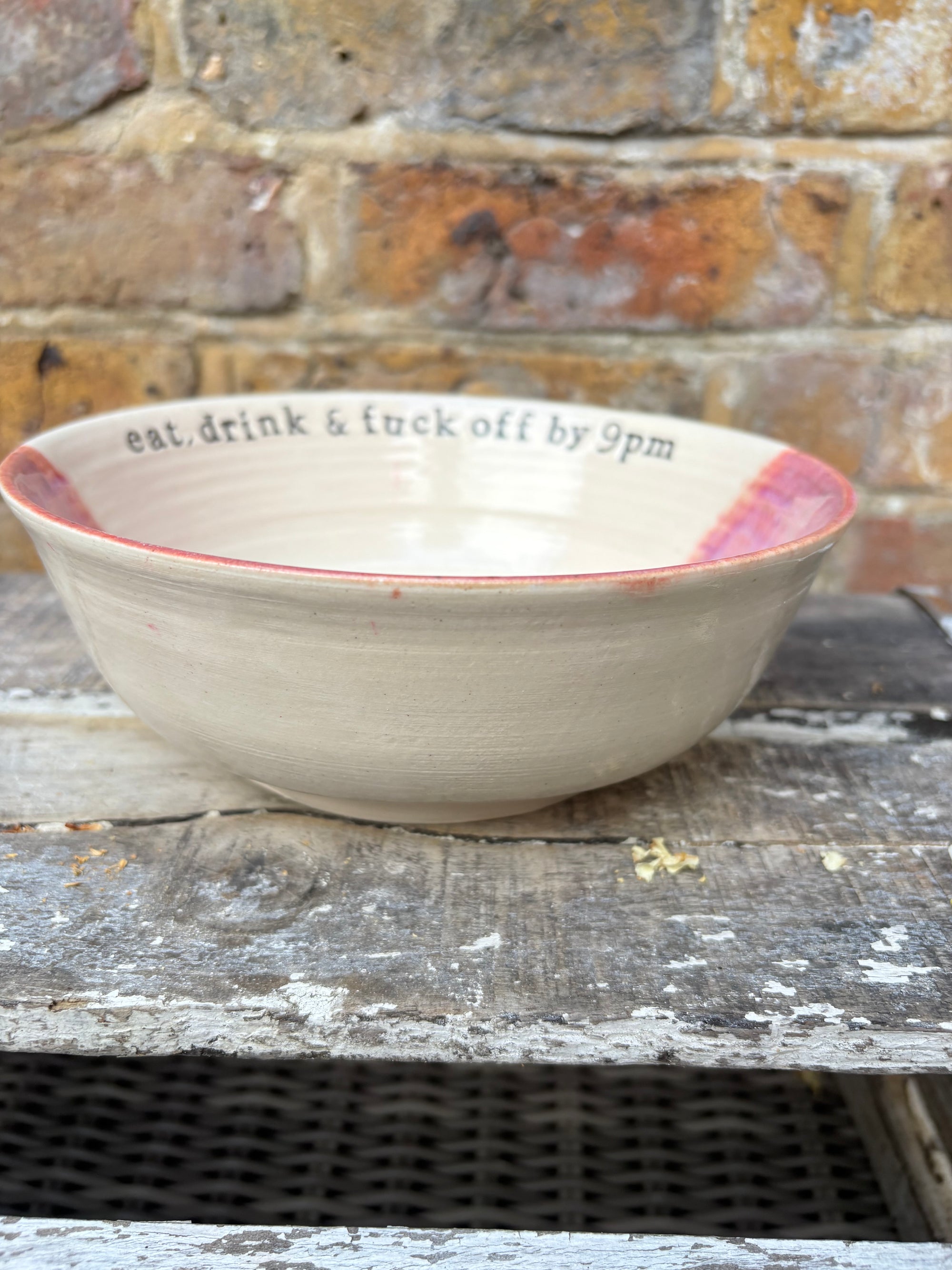 “eat, drink and fuck off by 9pm"  deep round salad/pasta bowl (pink/white, cream clay)