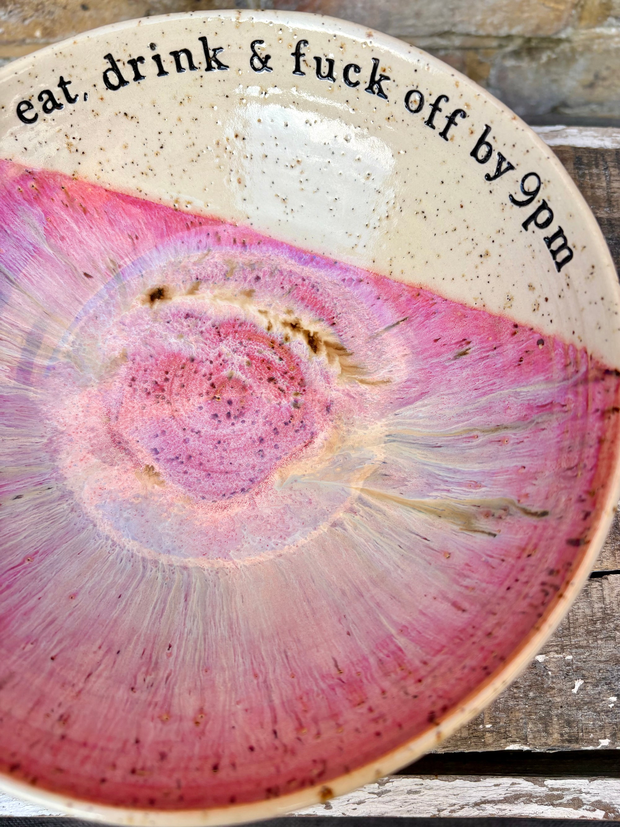 “eat, drink and fuck off by 9pm"  deep round salad/pasta bowl (pink, flecked clay)