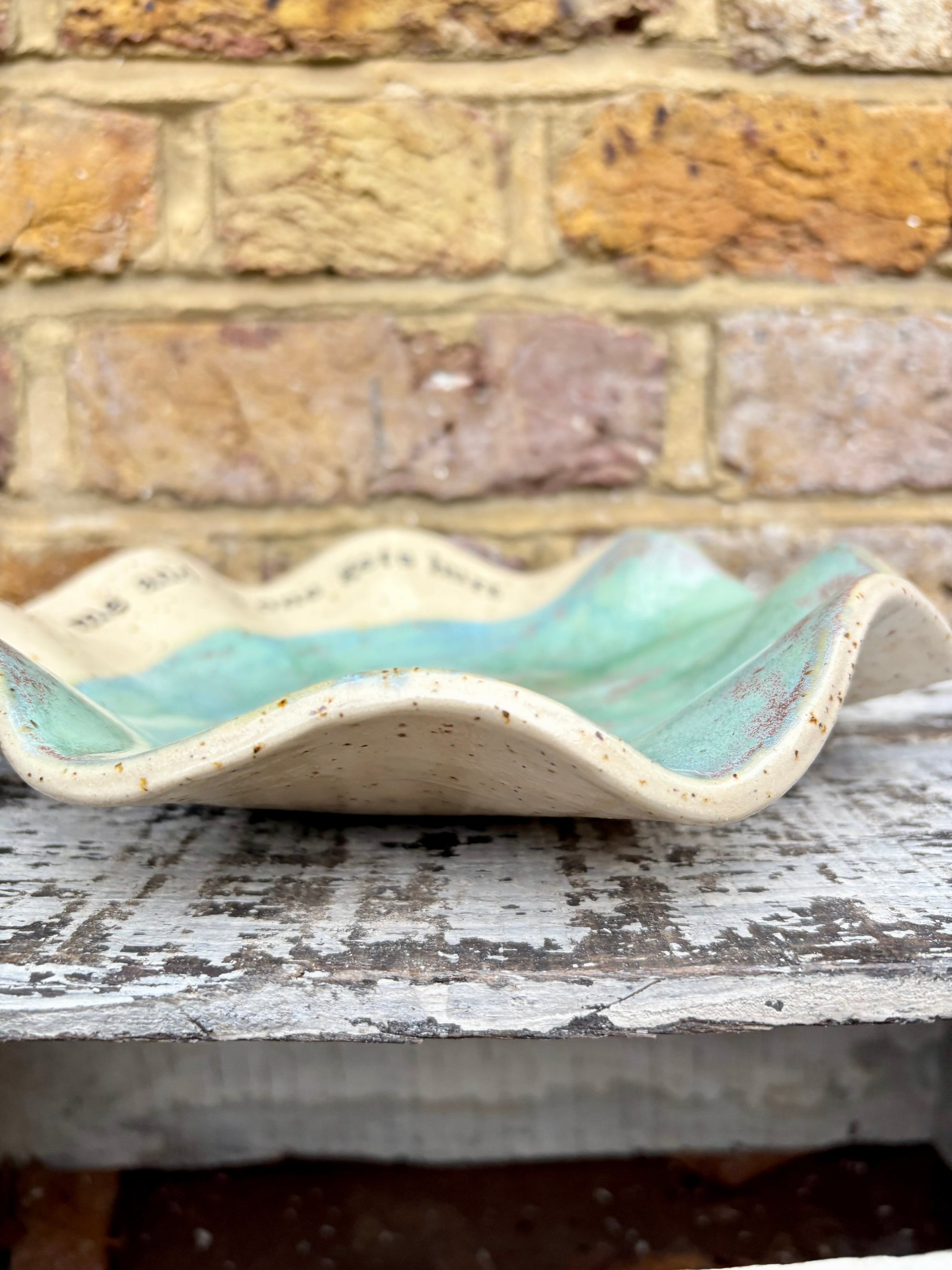 "feed me and no one gets hurt"  serving dish