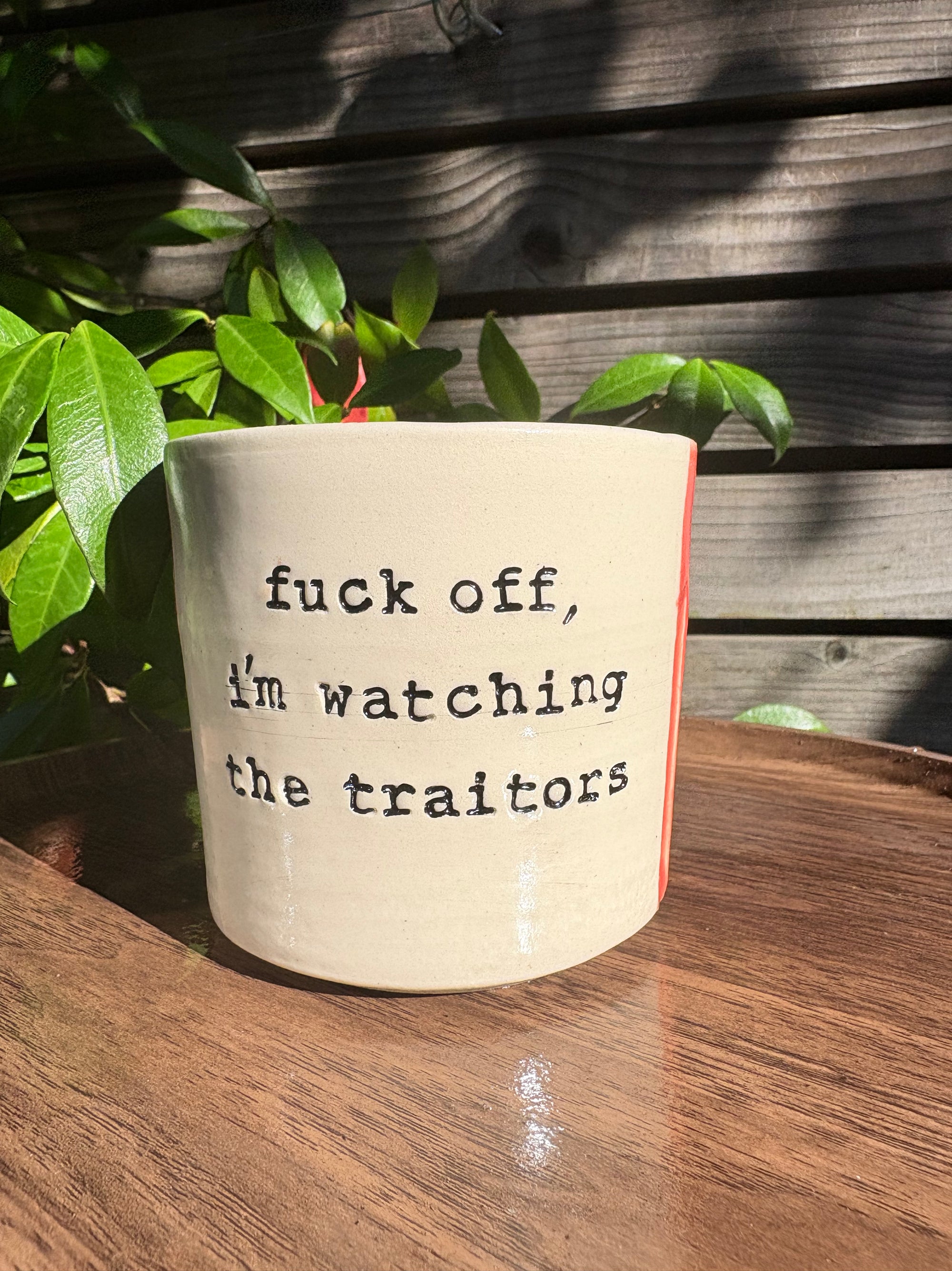 "fuck off, i'm watching the traitors" mug (no handle/orange speckle/grooves, 320ml)