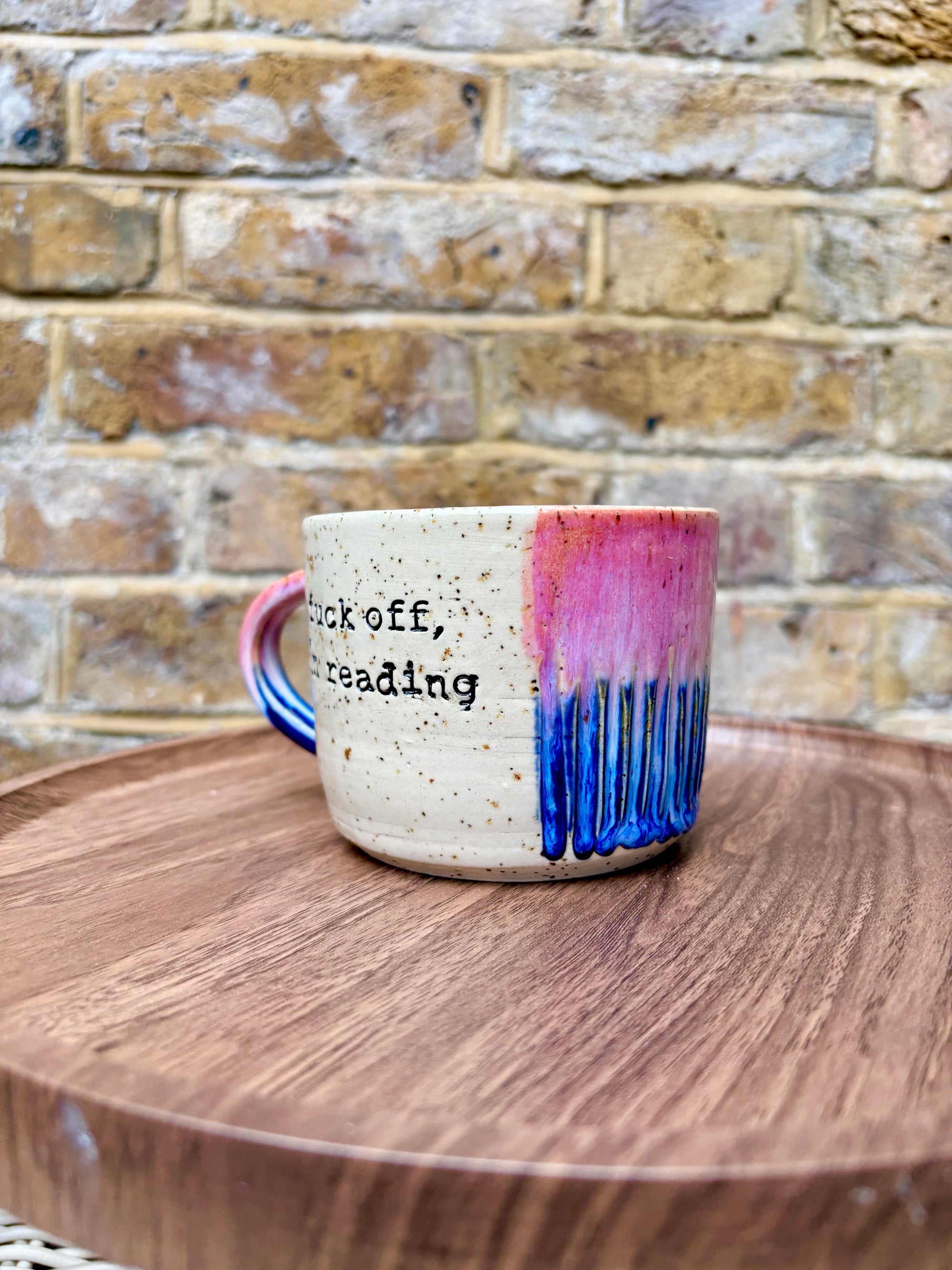 “Fuck off i'm reading" mug (Pink/blue/flecked)