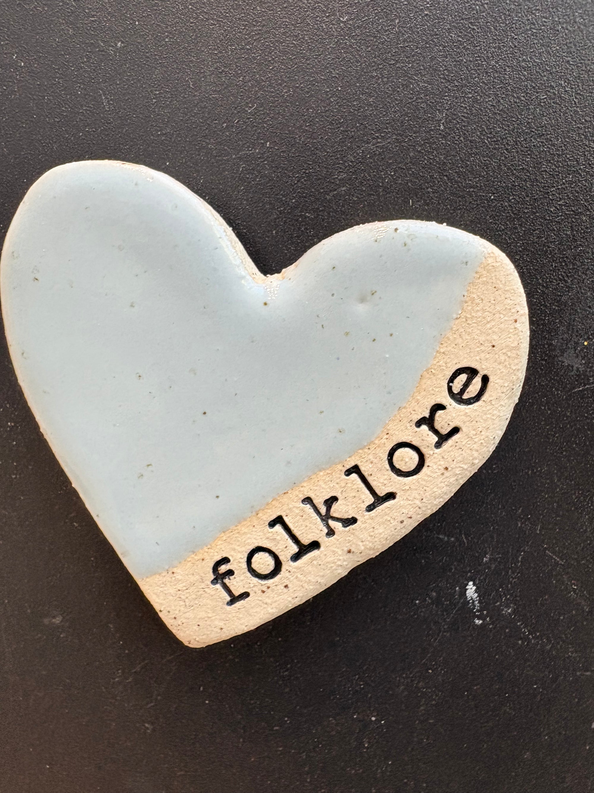 Twelve heart shaped Taylor Swift album magnets
