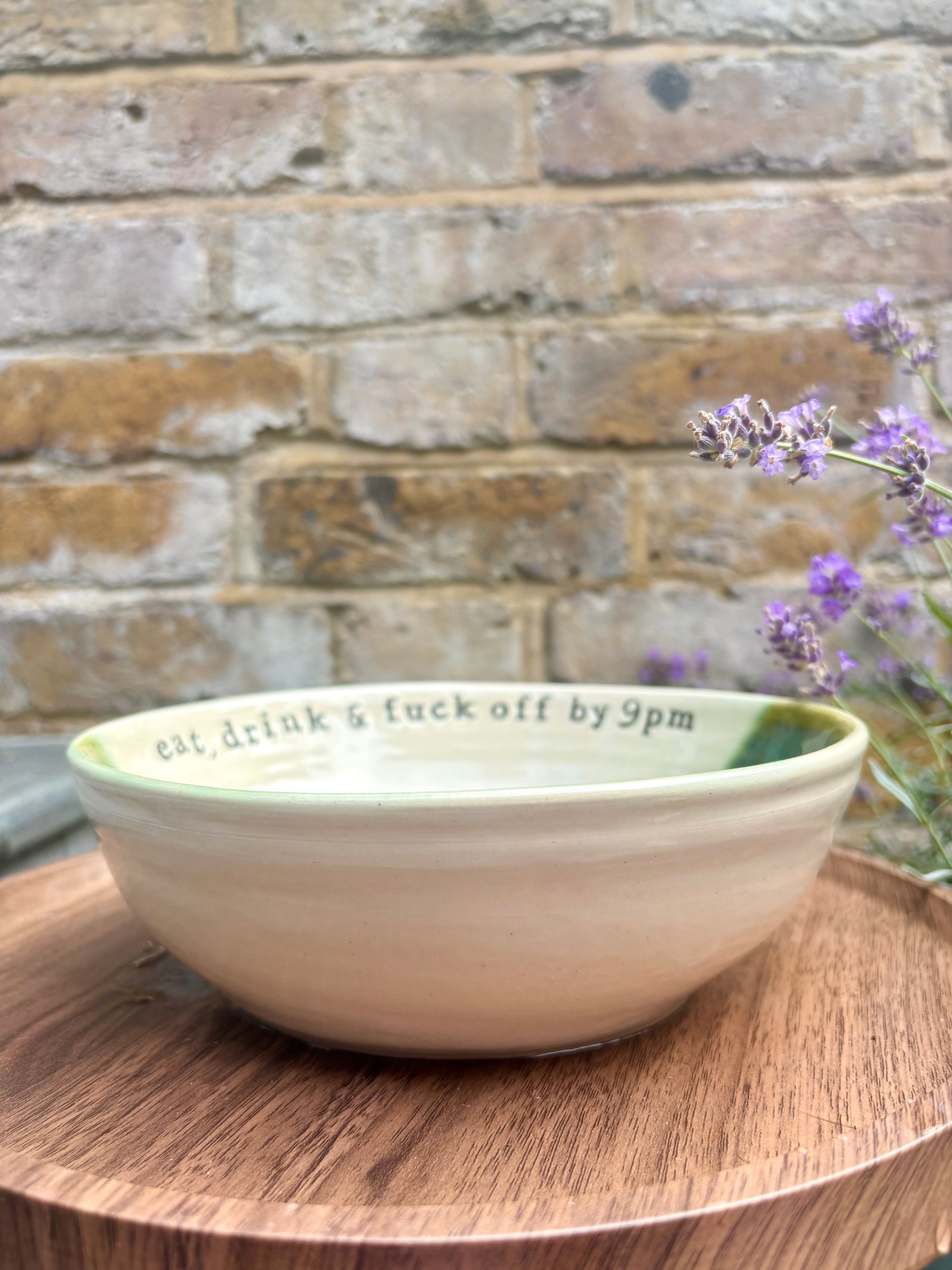 “eat, drink and fuck off by 9pm" round (ish) pasta/salad/serving bowl (green, cream clay)