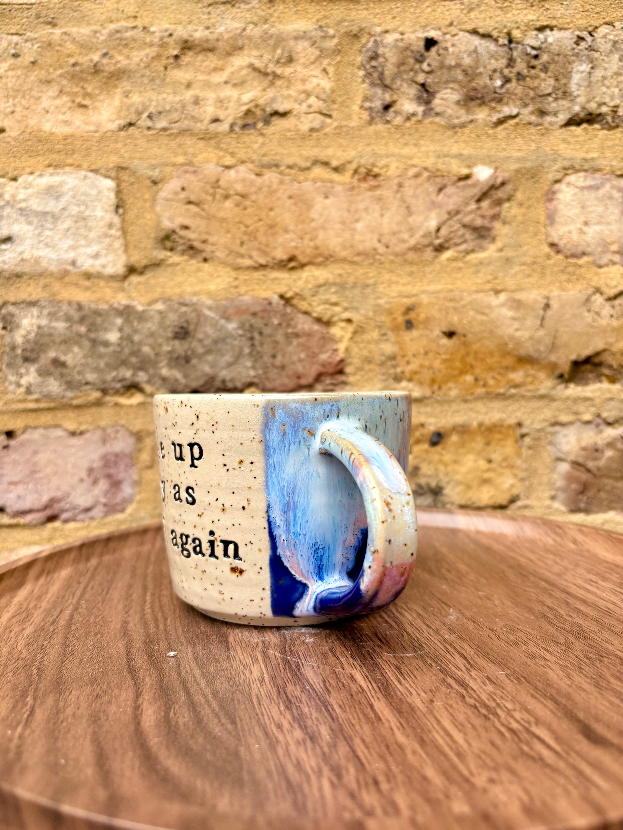 “woke up sexy as hell again” mug (flecked, pink night sky)