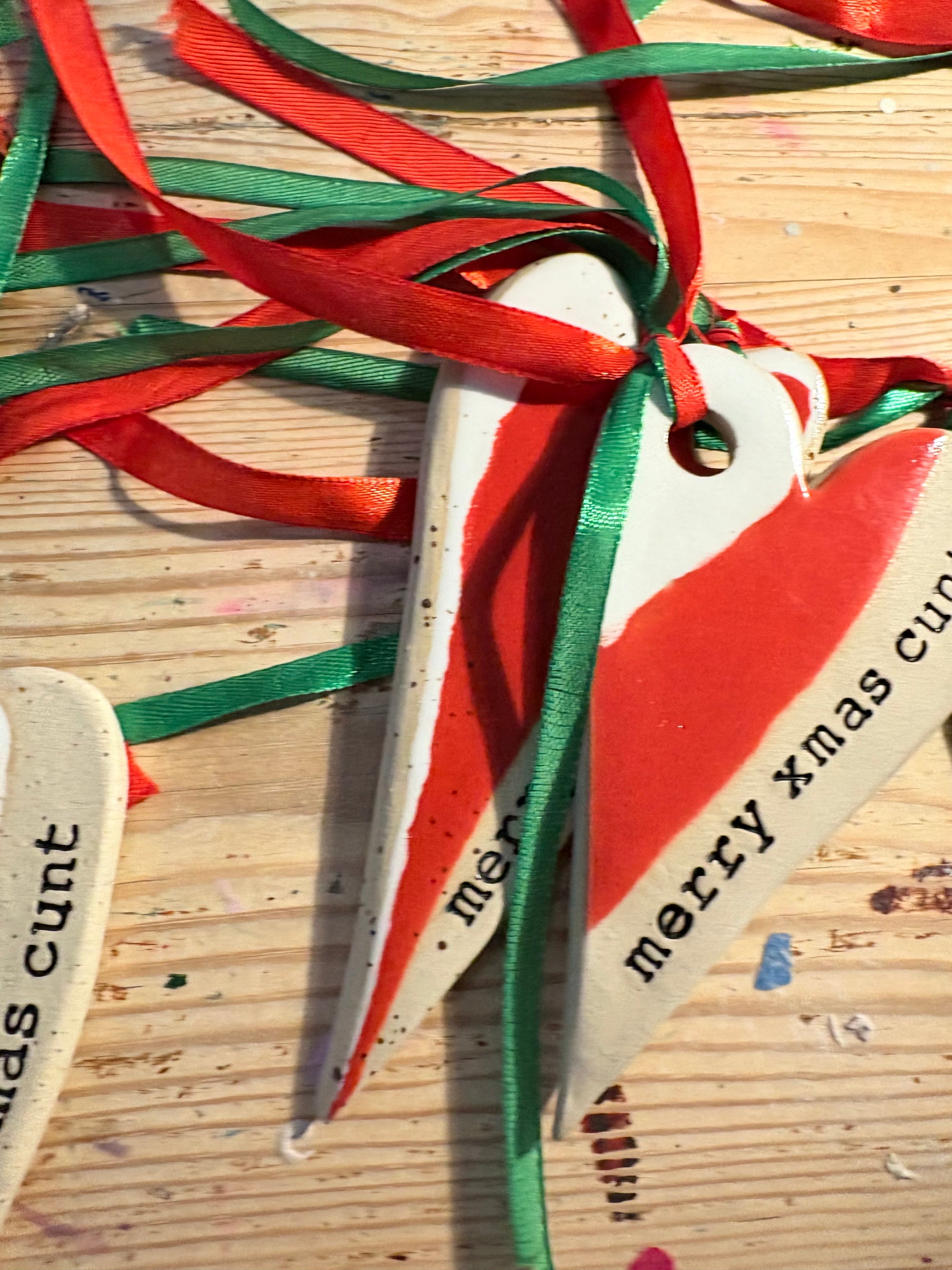 “merry xmas cunt” hanging decoration (red and white, large)