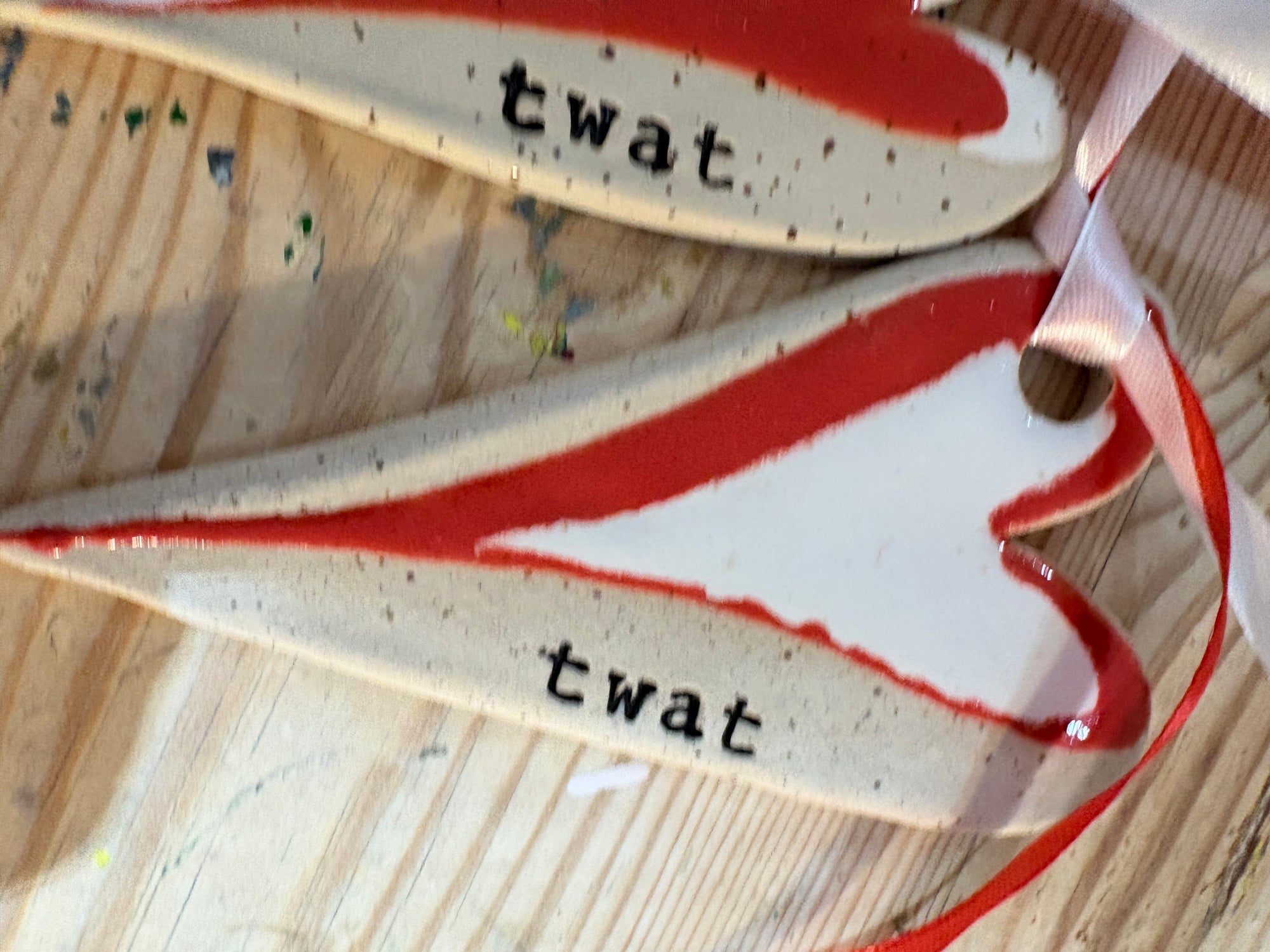 “twat” hanging decoration (red and white, large)