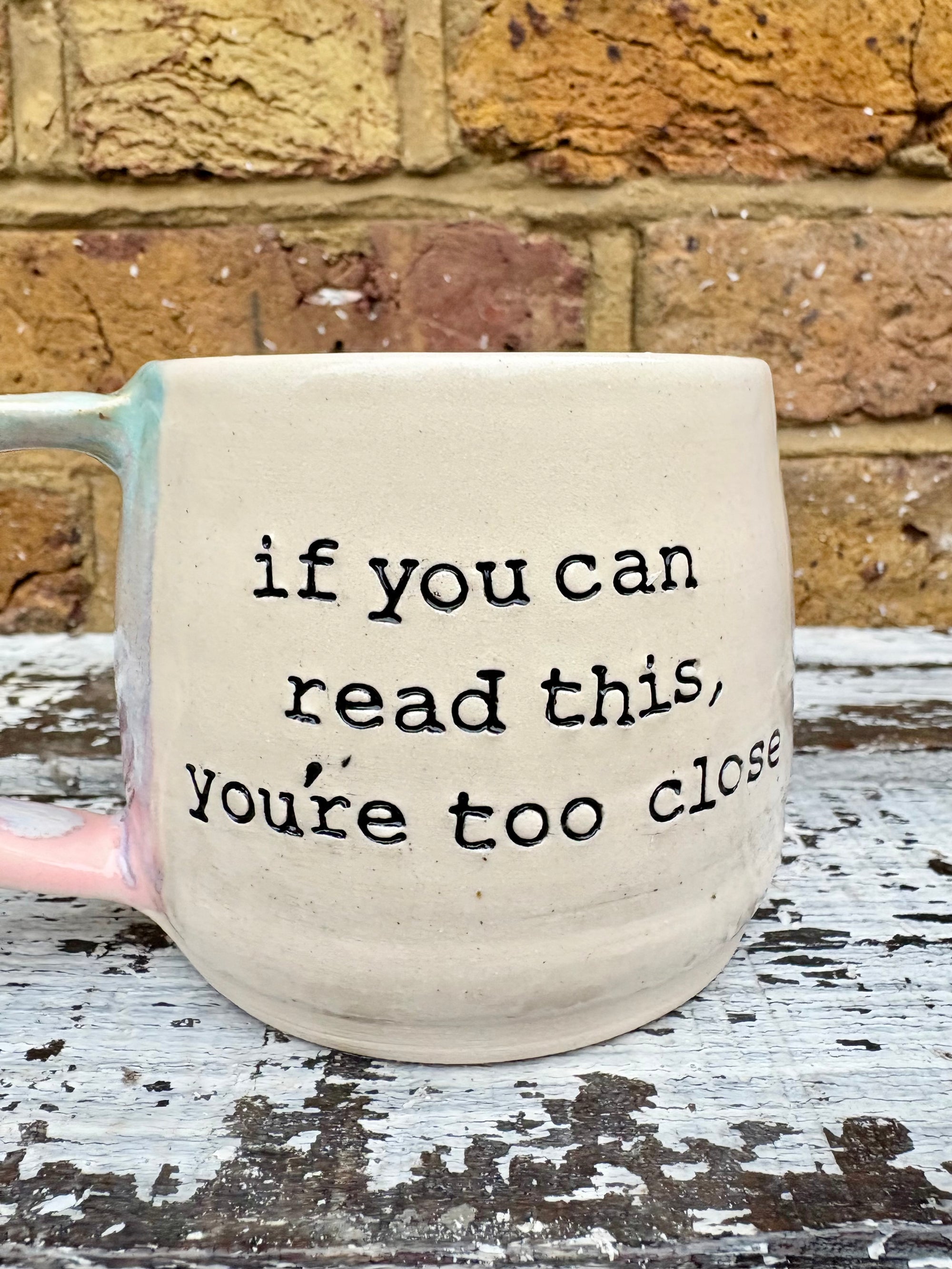 "if you can read this, you're too close" mug (Pink Skies)